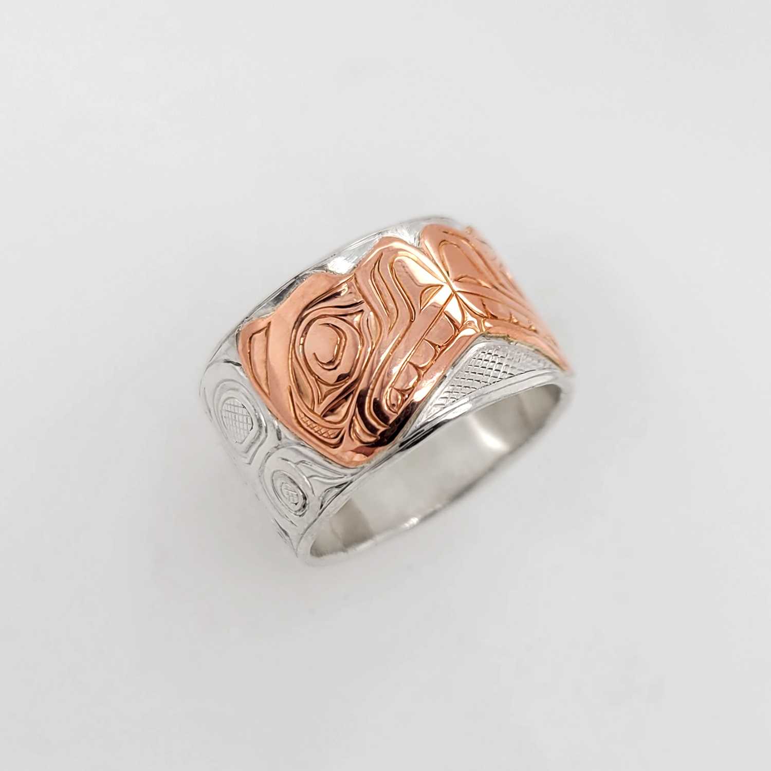 Silver and Rose Gold Otters Ring by Kwakwaka'wakw artist Joe Wilson