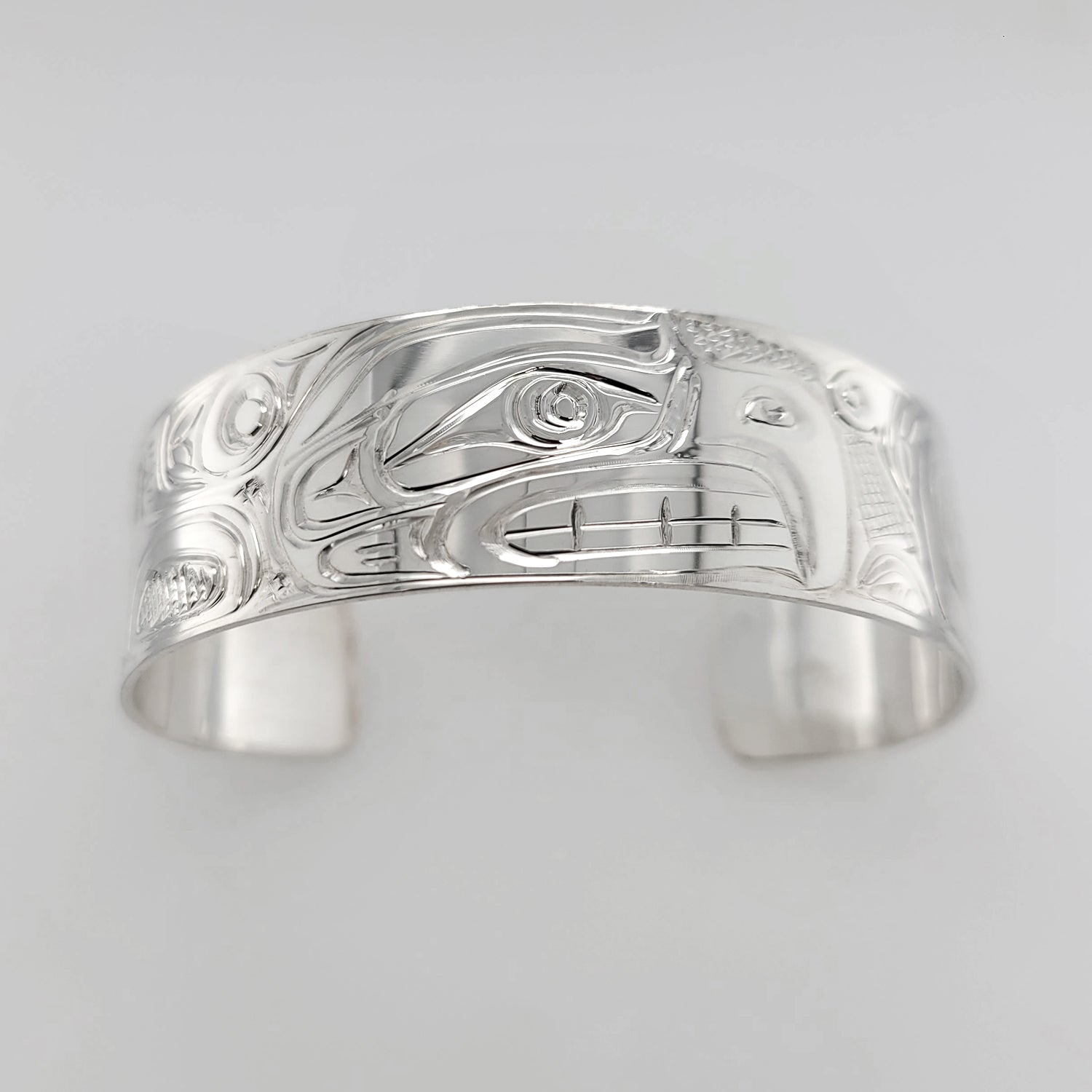 Silver Thunderbird & Kulus Bracelet by Don Wadhams, Kwakwaka'wakw