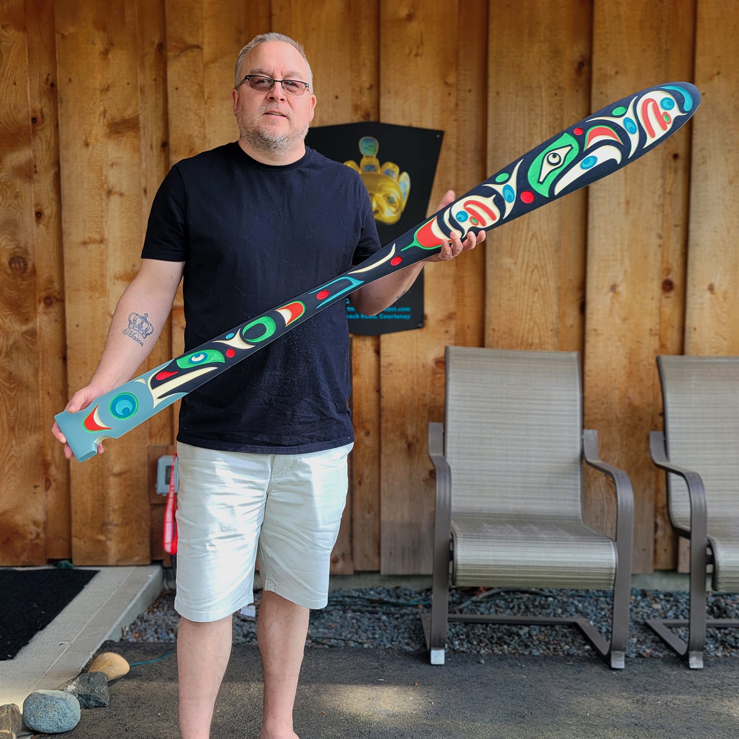 Sandblasted Yellow cedar Eagle Paddle by Kwakwaka'wakw artist Trevor Hunt