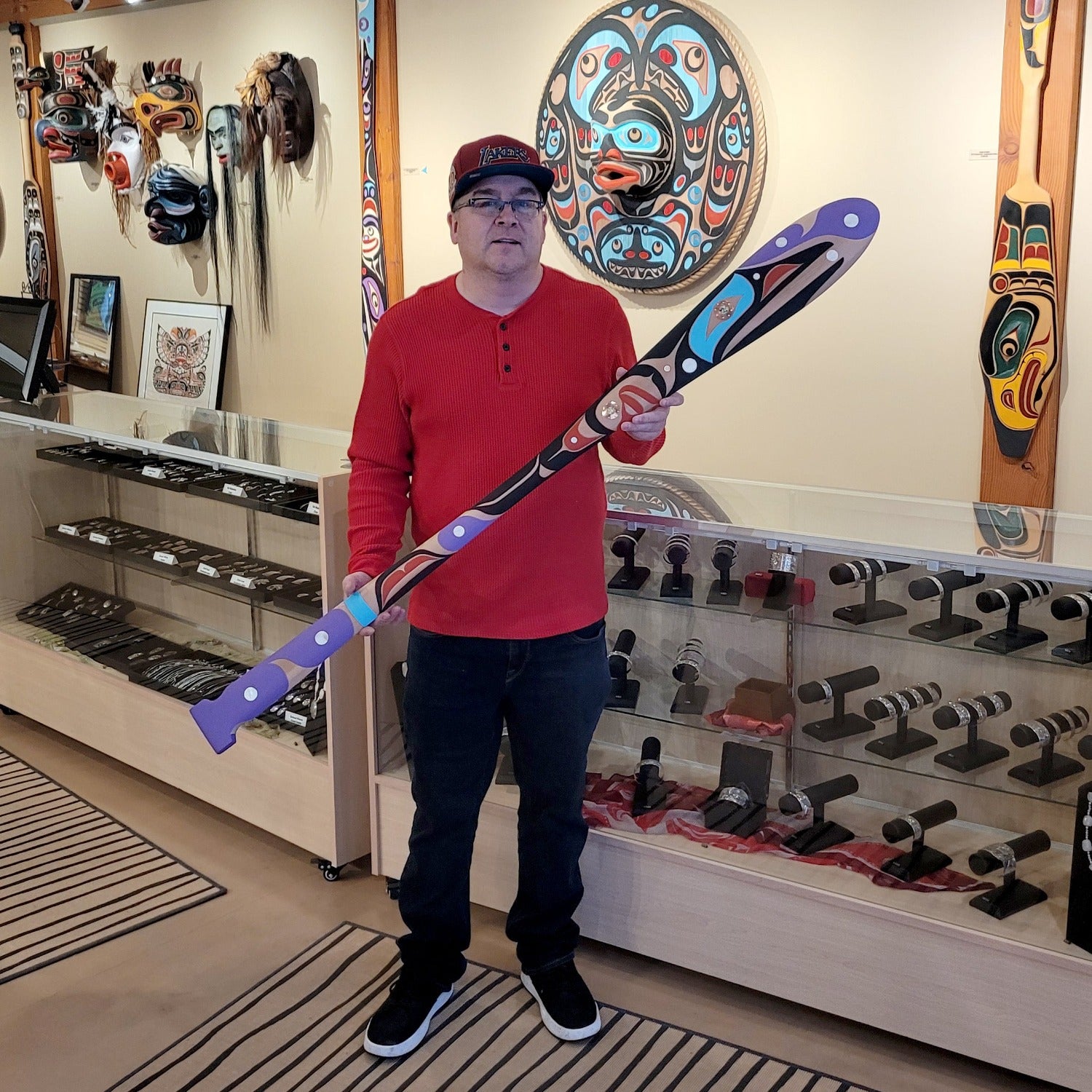 Carved Hummingbird Paddle by Kwakiutl carver Trevor Hunt