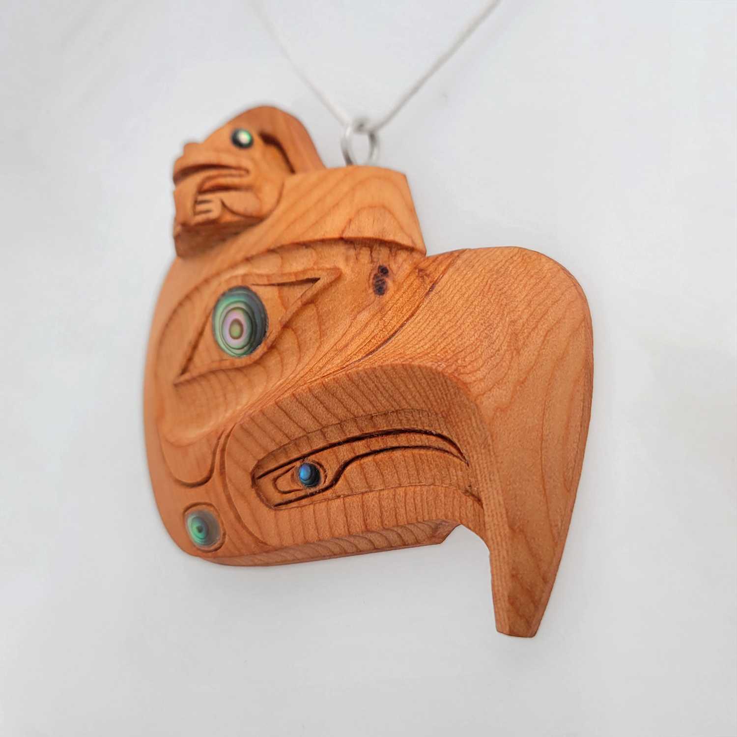 Yew Eagle and Frog Pendant by Haida artist Ron Russ