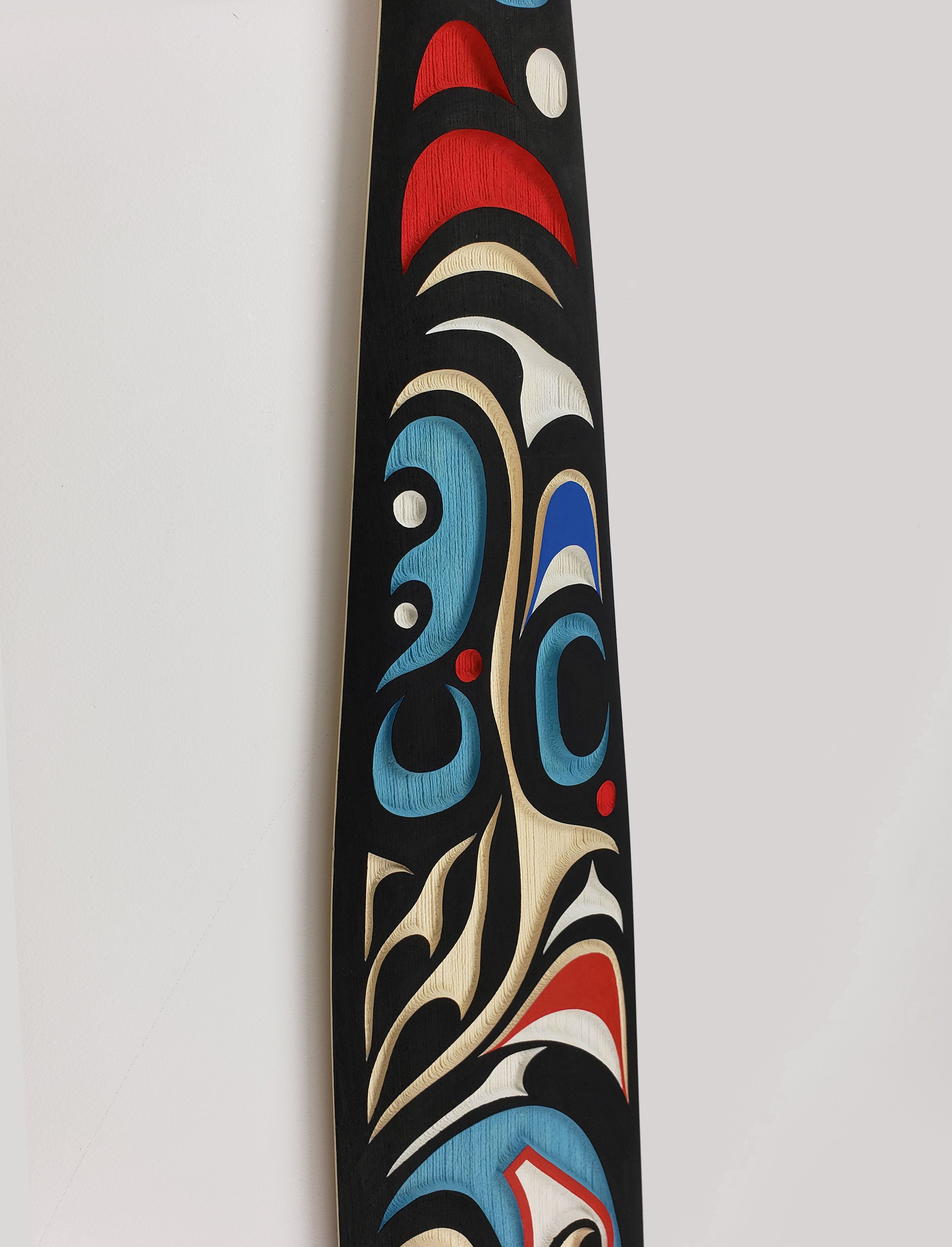 Sandblasted Cedar Sea Wolf Paddle by Kwakiutl artist Trevor Hunt