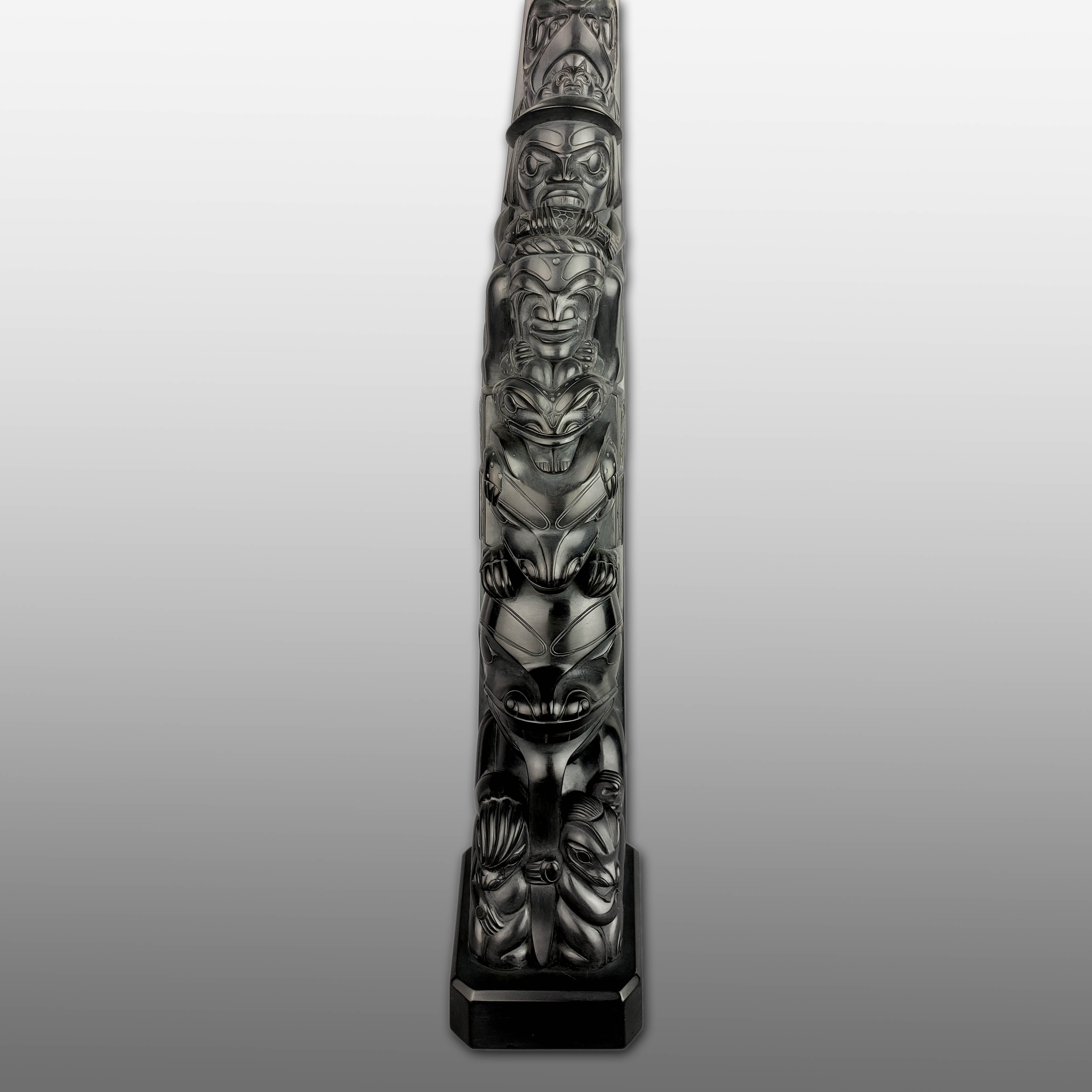 Large Argillite Bear Mother Totem Pole by Haida carver Henry White