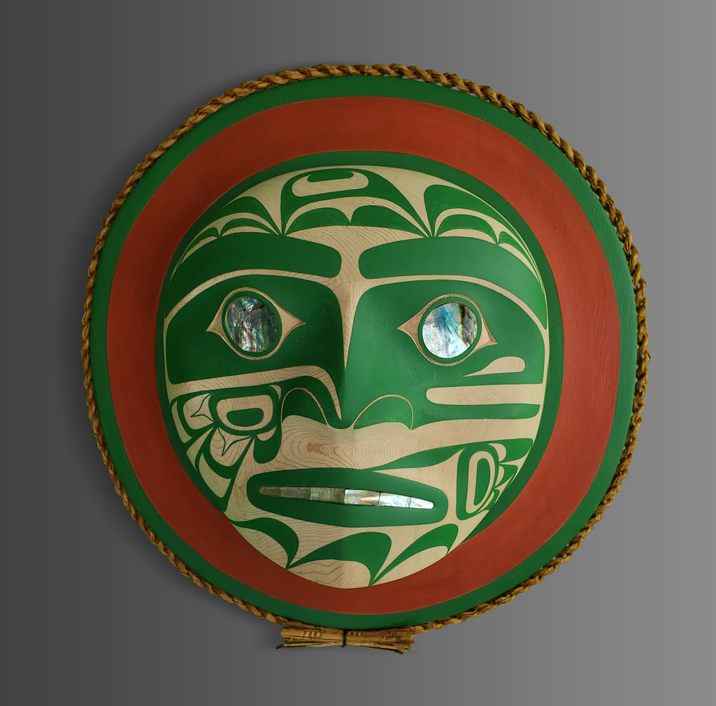 Green and red Moon Mask by Kwagul Master Carver Calvin Hunt