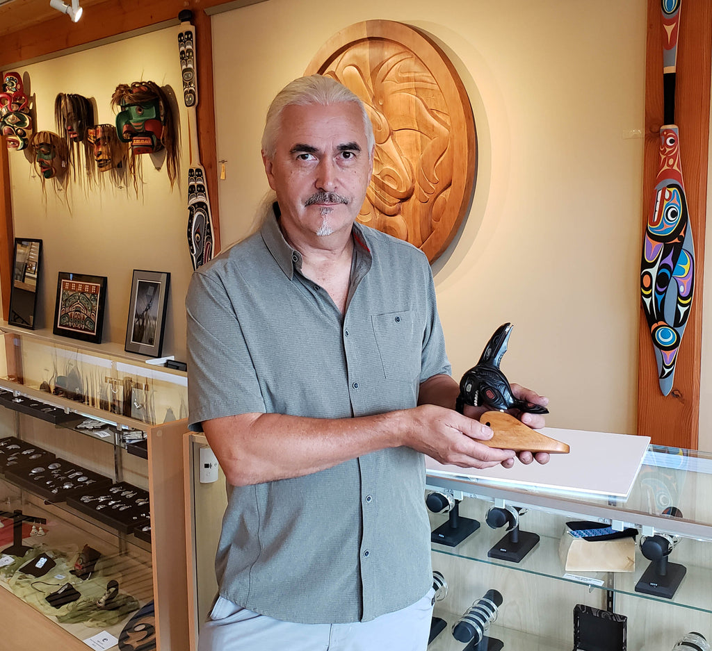 Haida carver Darrell White with Argillite Orca with Raven Fin Sculpture