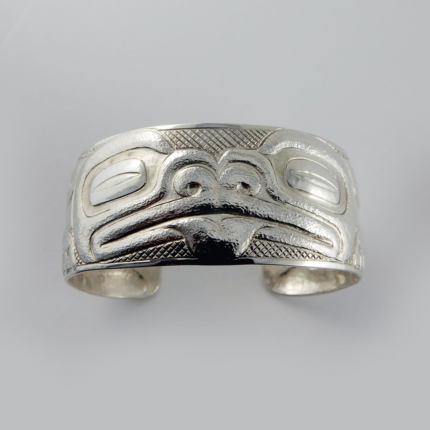 Silver Carved and Hammered Frog Bracelet by Haida artist Derek White