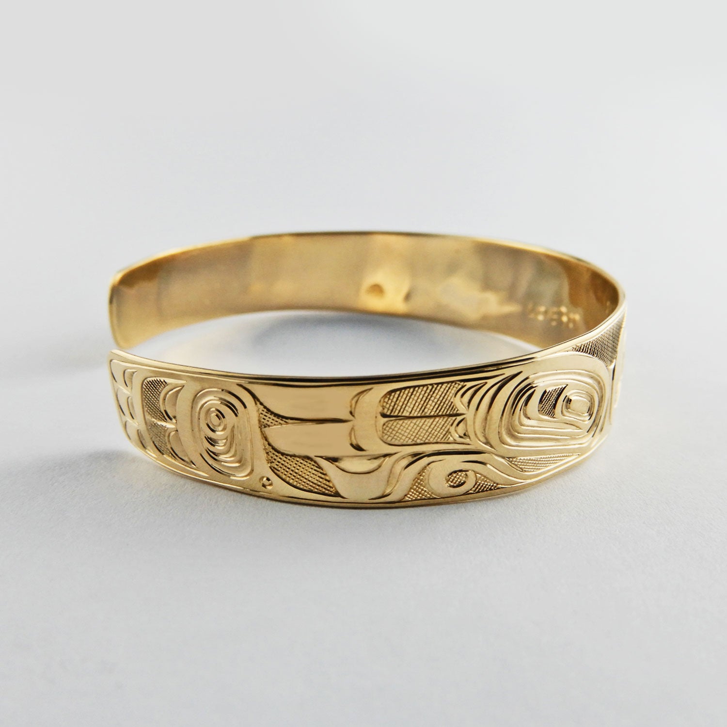 Gold First Nation Love Birds Bracelet by Kwakwaka'wakw artist Joe Wilson