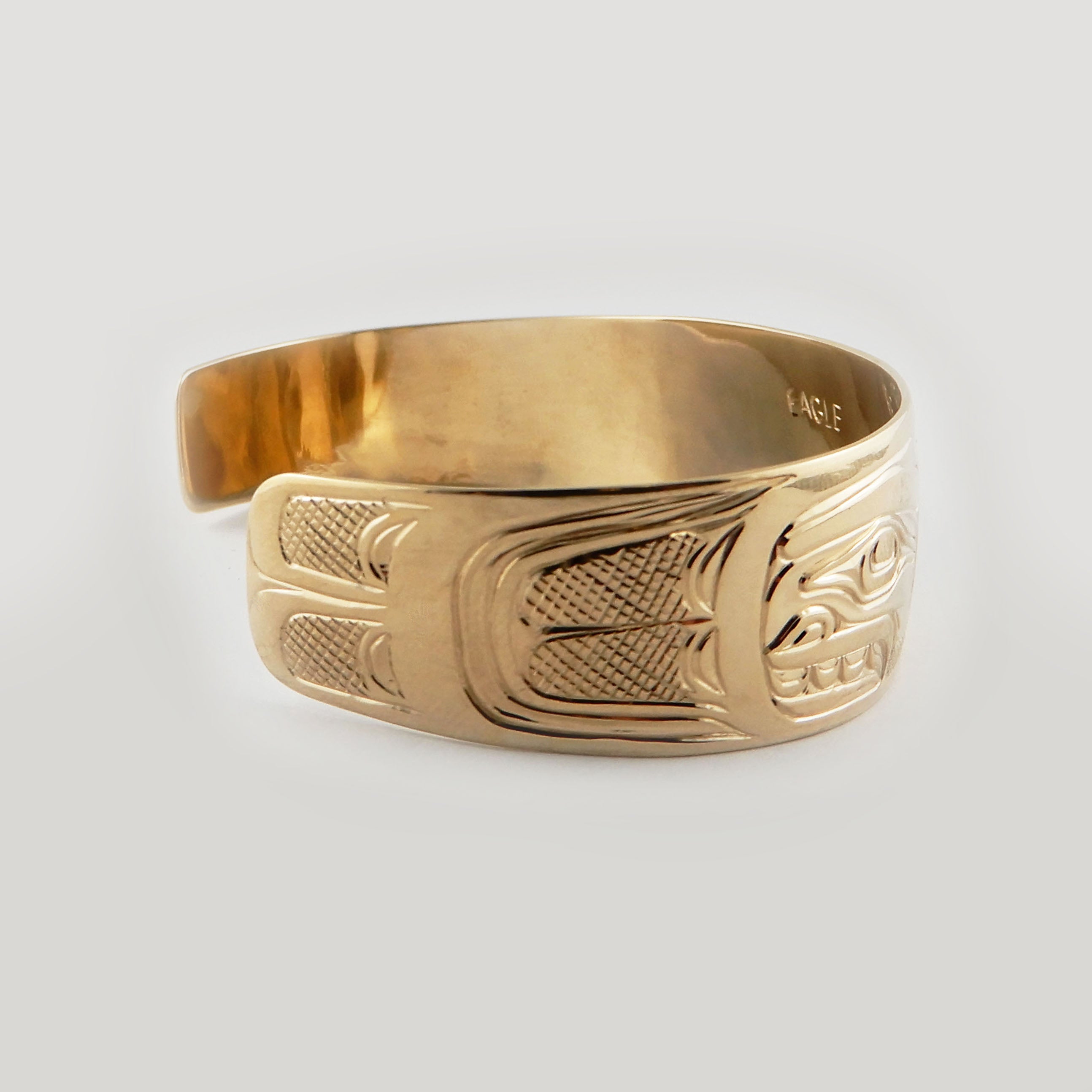Gold First Nations Eagle Bracelet by Kwakwaka'wakw artist Joe Wilson