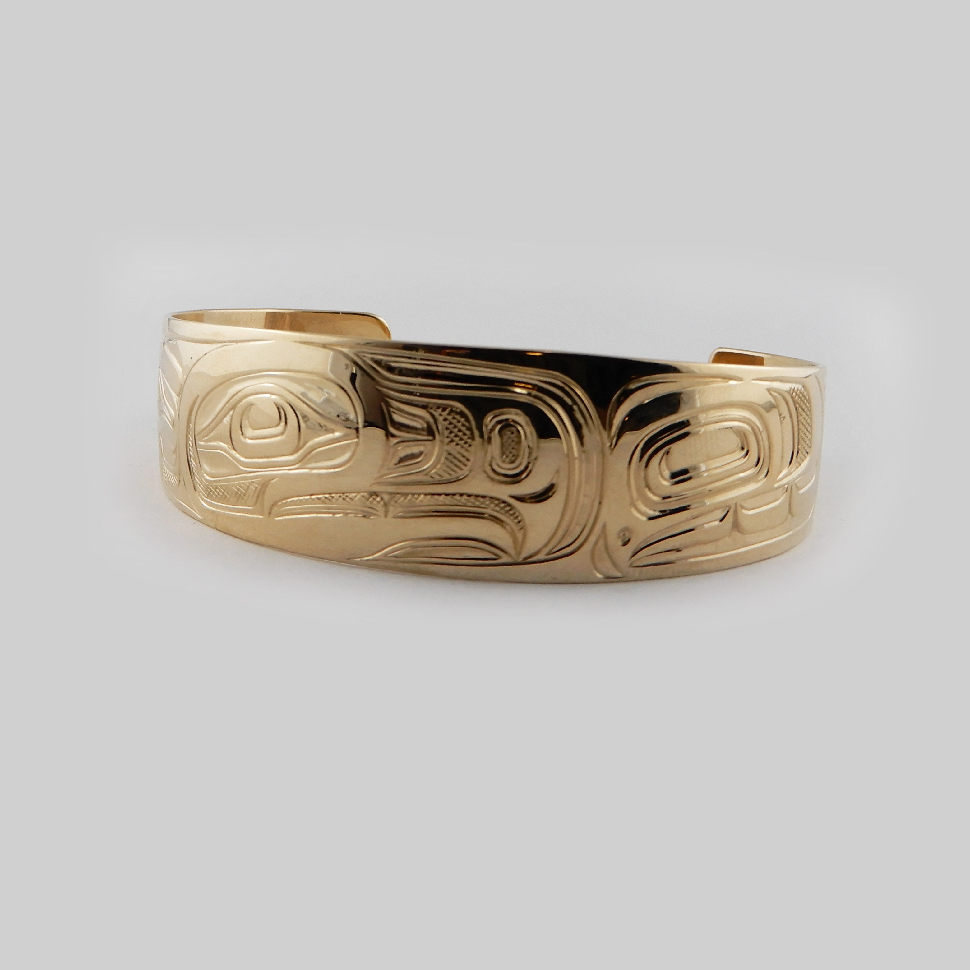 Gold First Nations Eagle Bracelet by Kwakwaka'wakw artist Joe Wilson