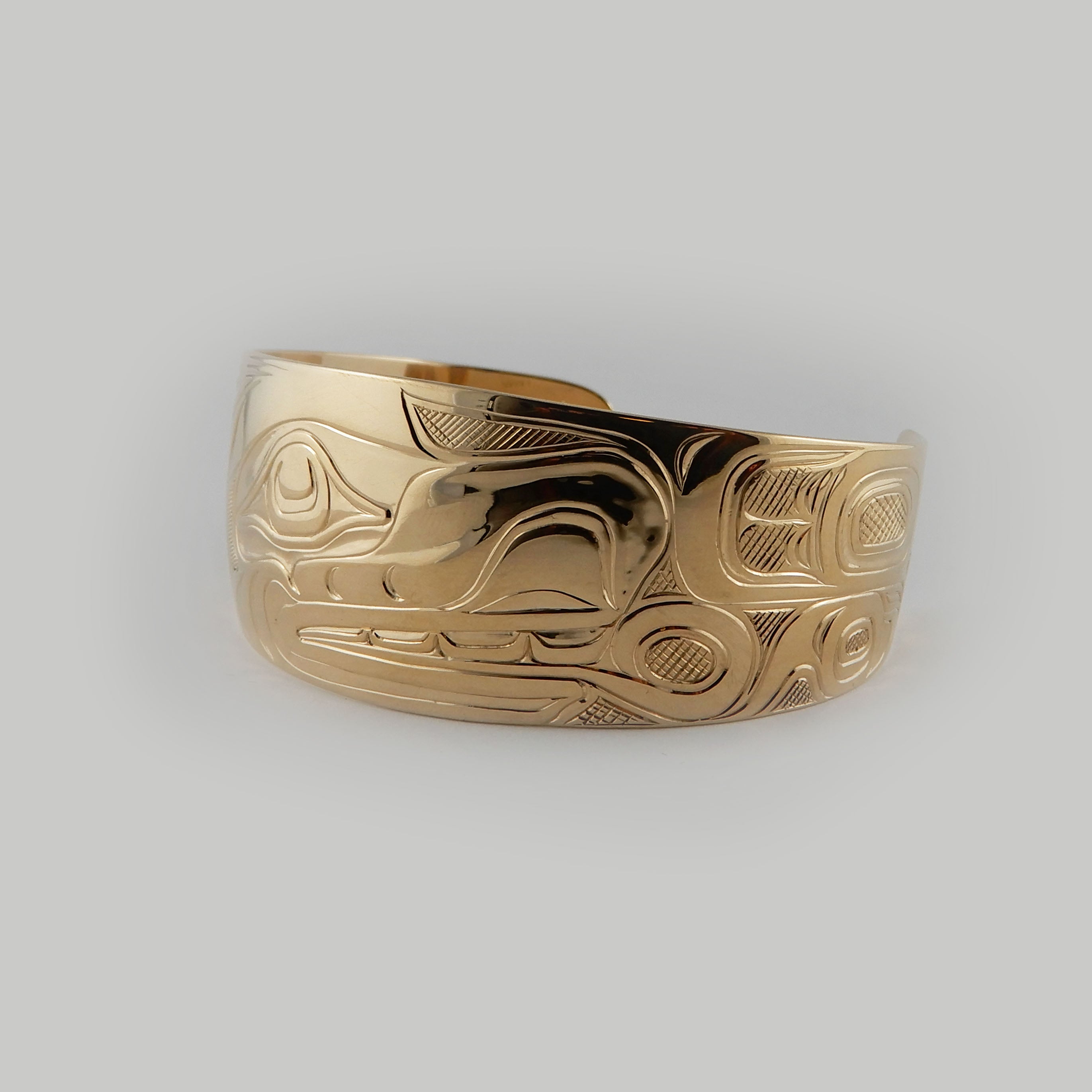 Gold Wolf First Nations Bracelet by Kwakwaka'wakw artist Joe Wilson