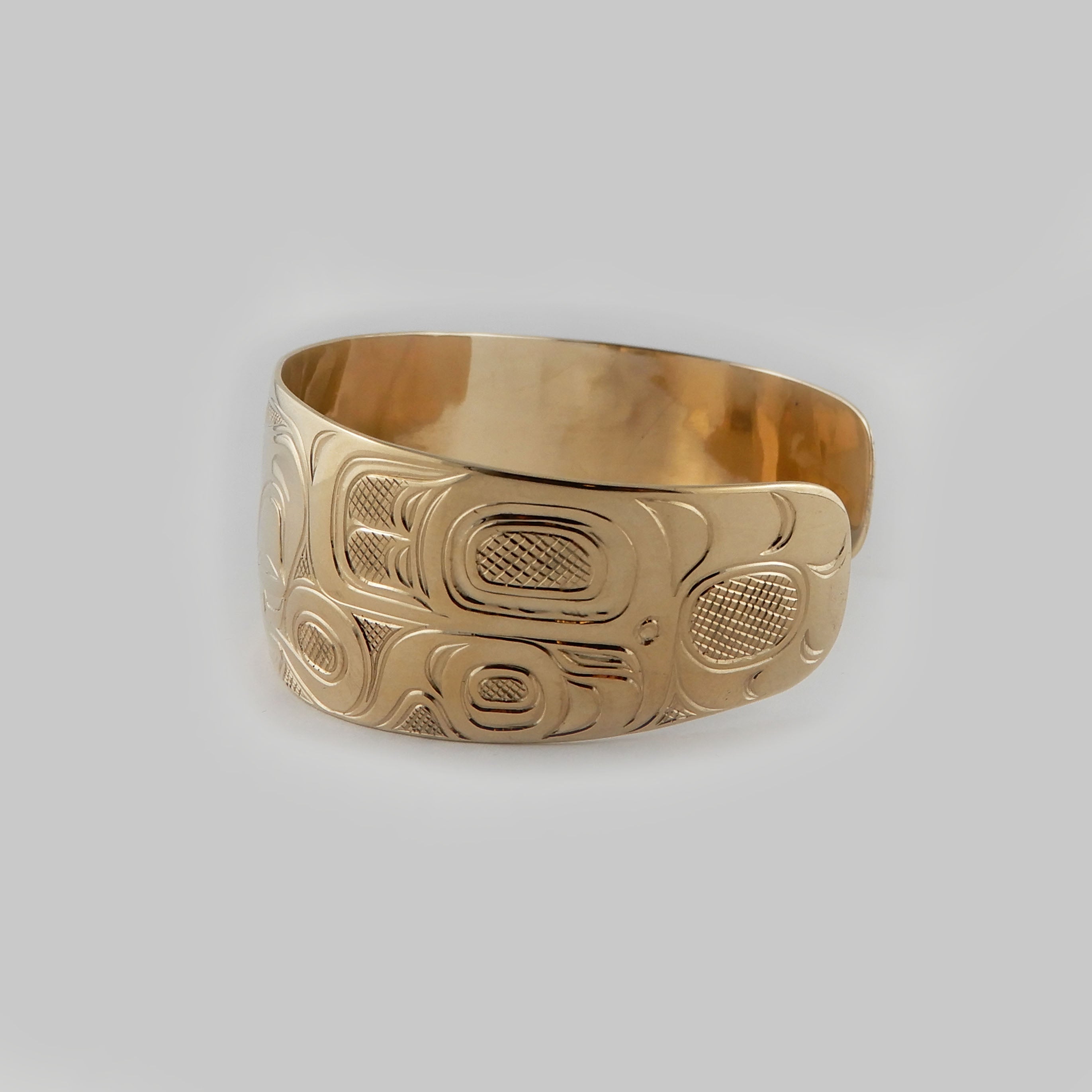 Gold Wolf First Nations Bracelet by Kwakwaka'wakw artist Joe Wilson