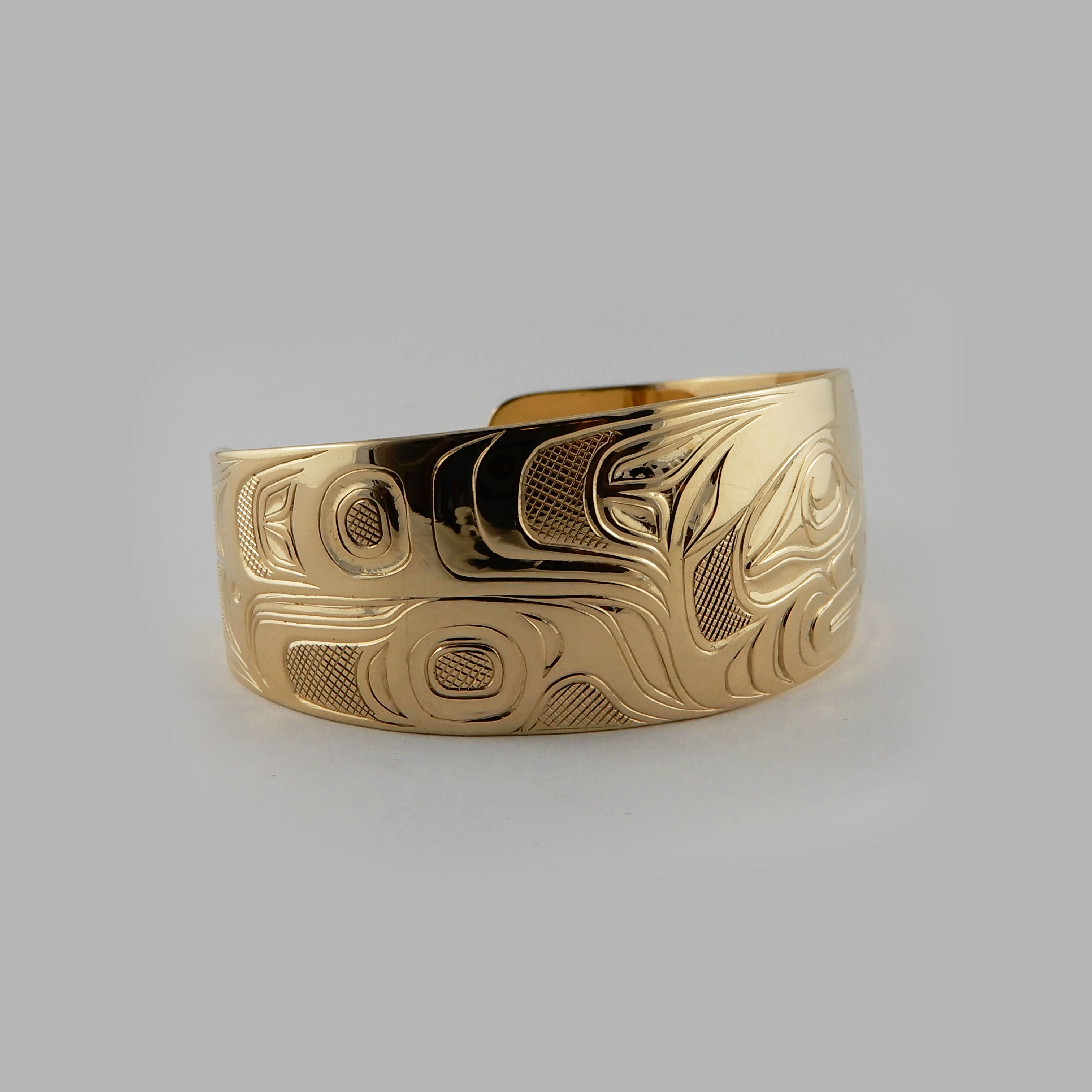 Gold Wolf First Nations Bracelet by Kwakwaka'wakw artist Joe Wilson