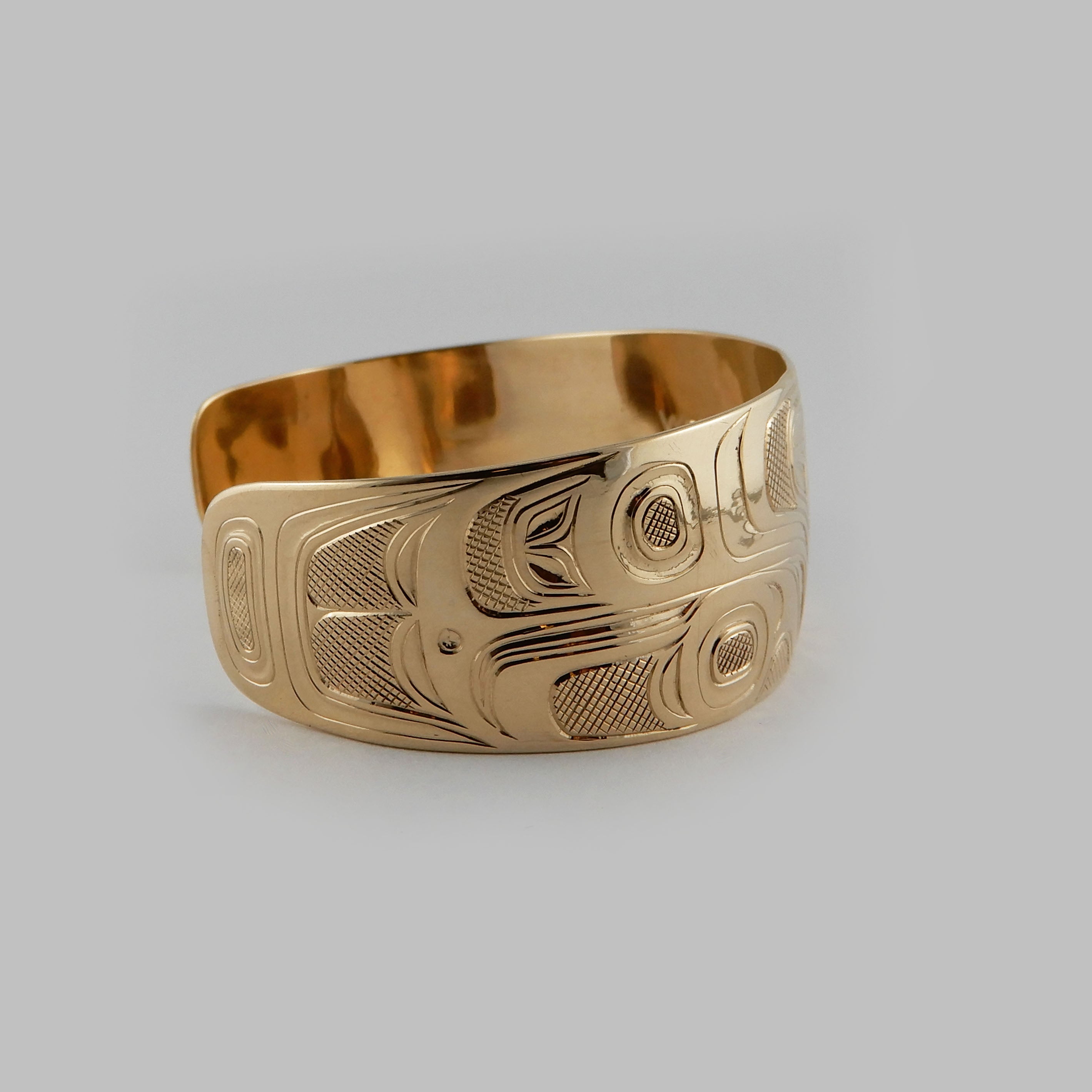 Gold Wolf First Nations Bracelet by Kwakwaka'wakw artist Joe Wilson
