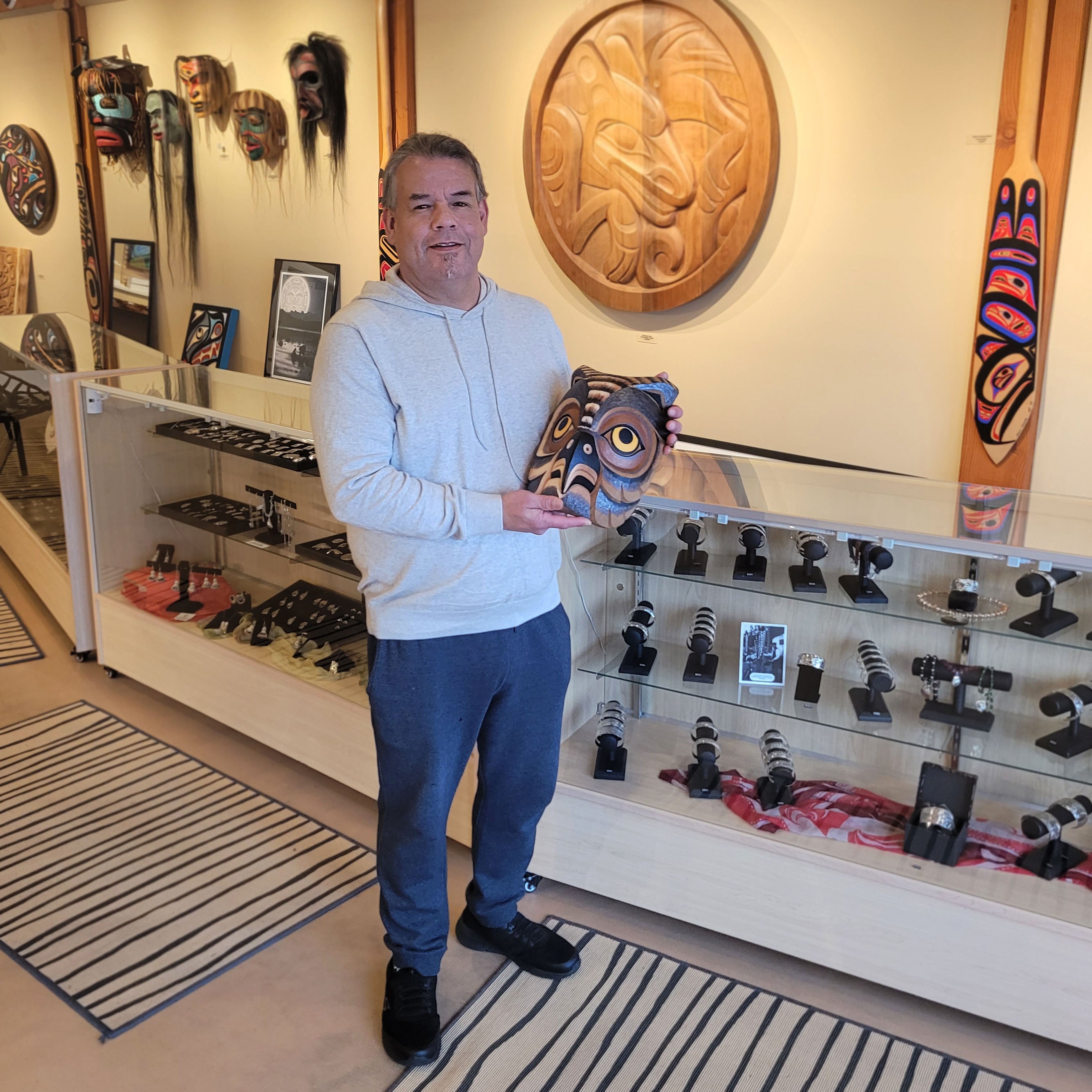 Kwakwaka'wakw carver Greg Henderson with Red Cedar Horned Owl Mask