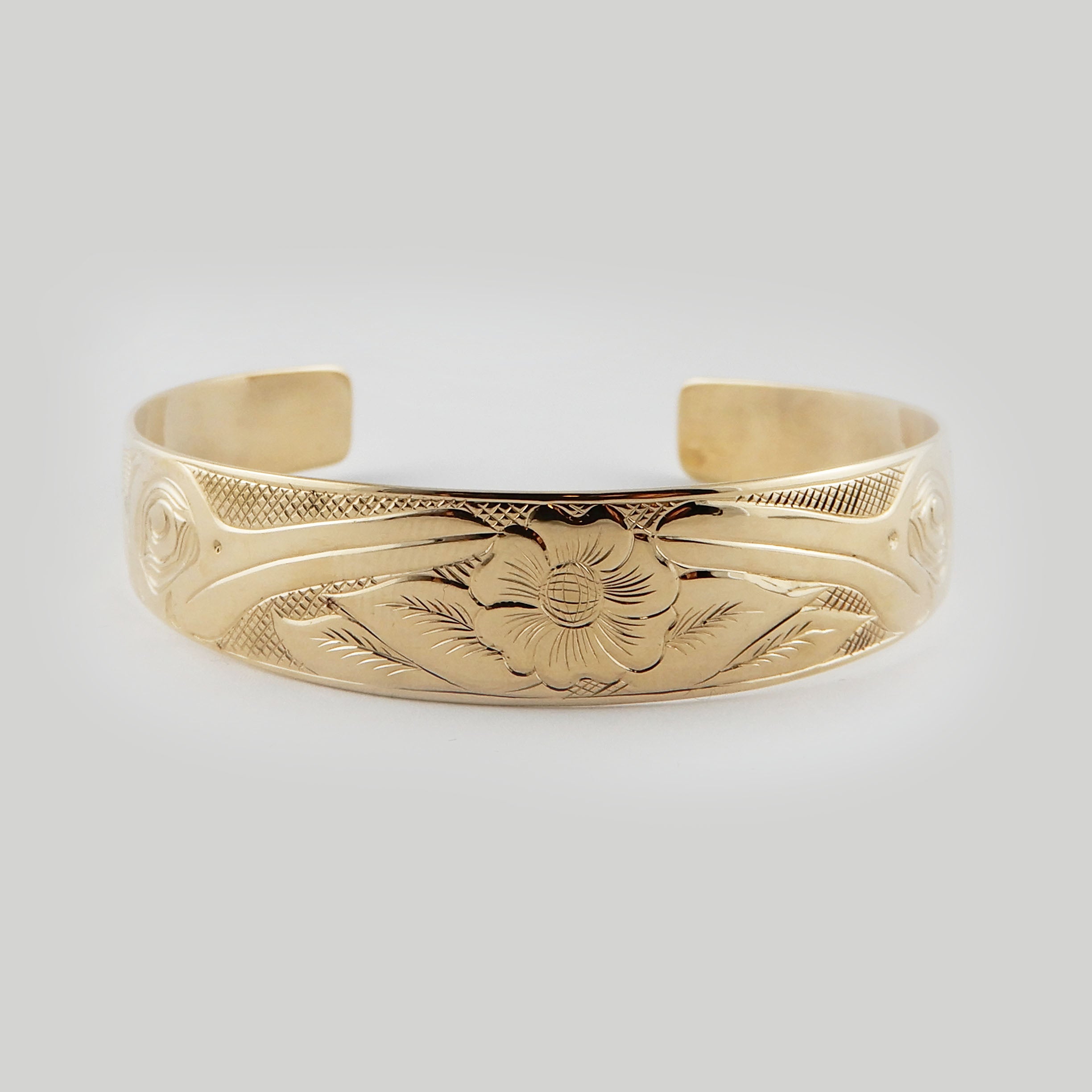 Gold Hummingbird First Nations Bracelet by Kwakwaka'wakw artist Joe Wilson