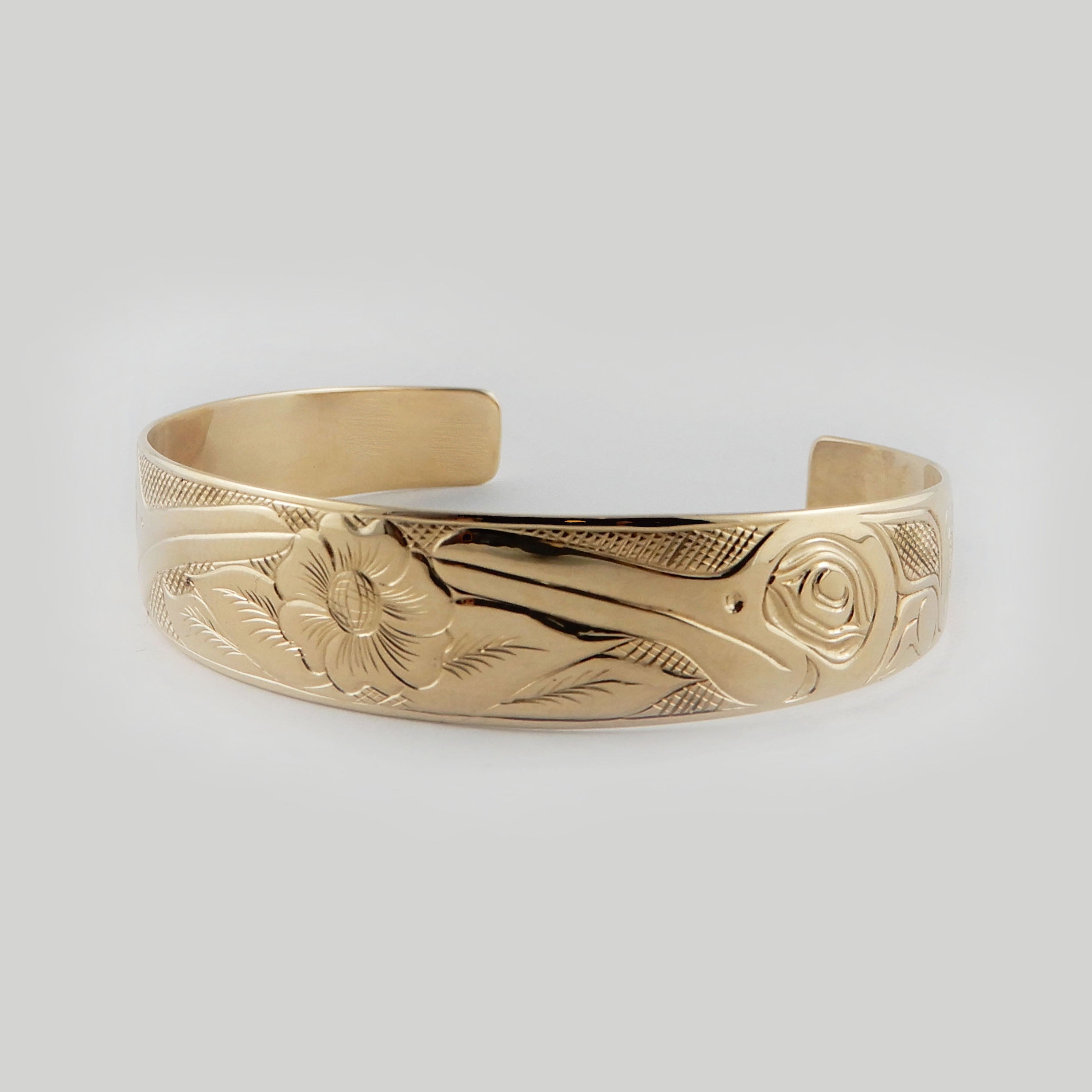 Gold Hummingbird First Nations Bracelet by Kwakwaka'wakw artist Joe Wilson