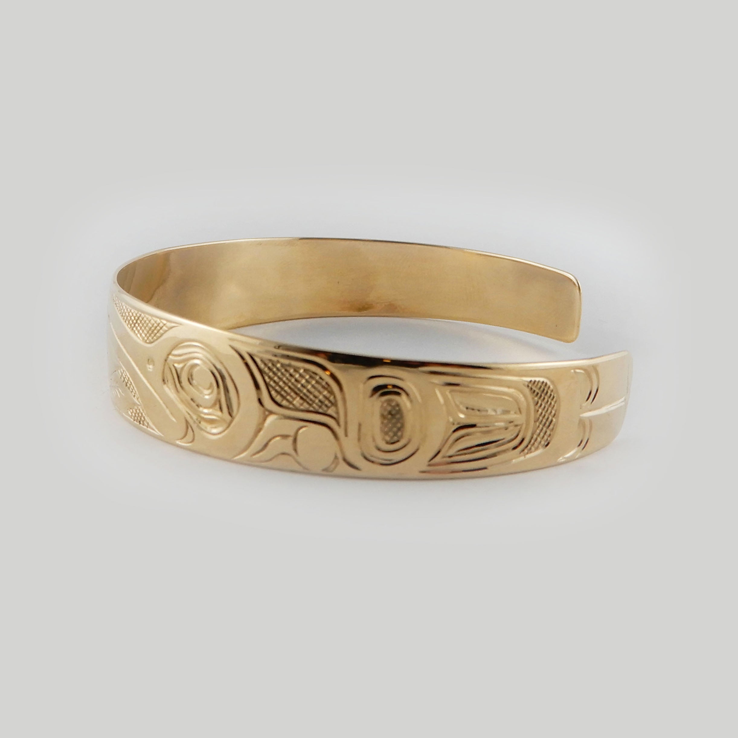 Gold Hummingbird First Nations Bracelet by Kwakwaka'wakw artist Joe Wilson