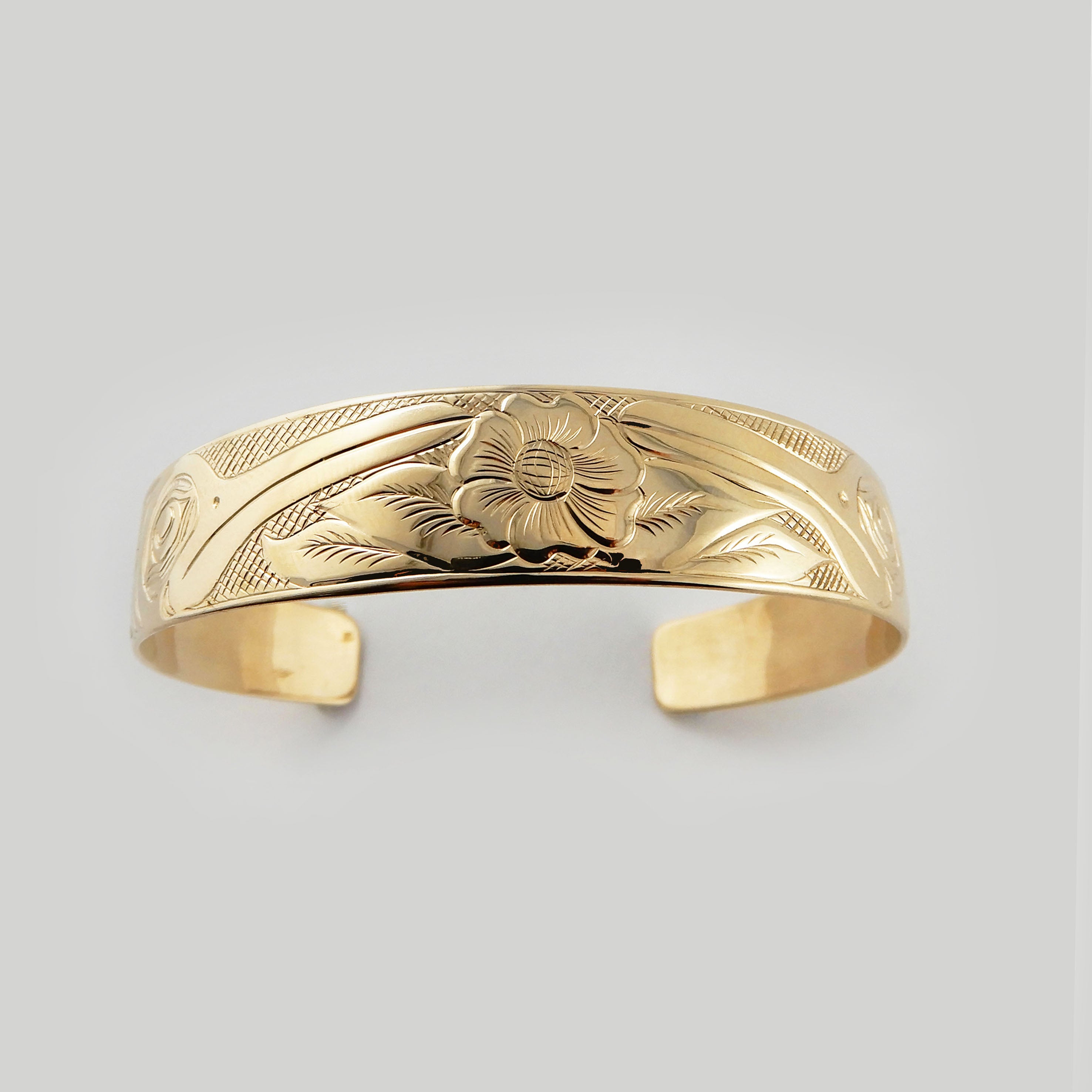 Gold Hummingbird First Nations Bracelet by Kwakwaka'wakw artist Joe Wilson