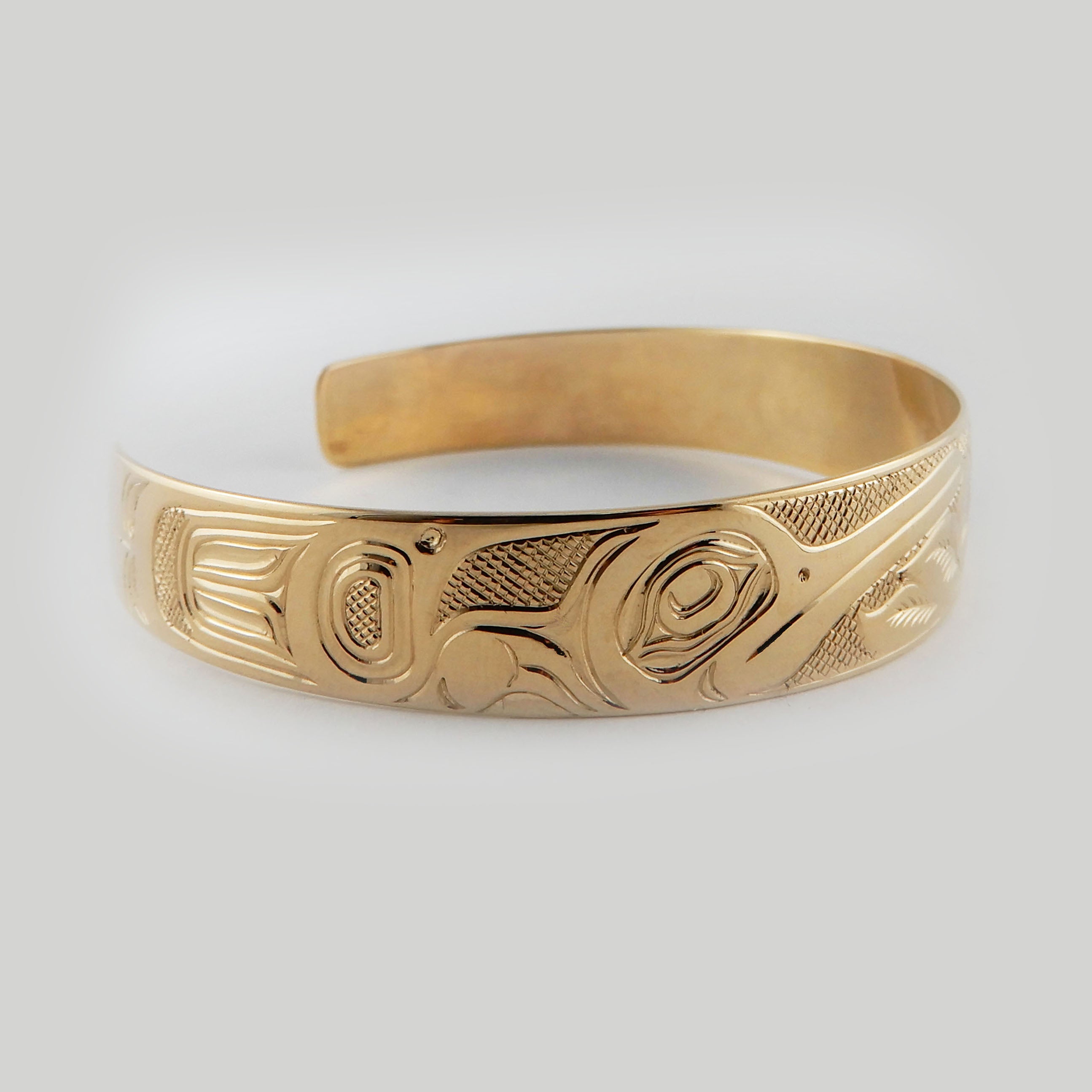 Gold Hummingbird First Nations Bracelet by Kwakwaka'wakw artist Joe Wilson