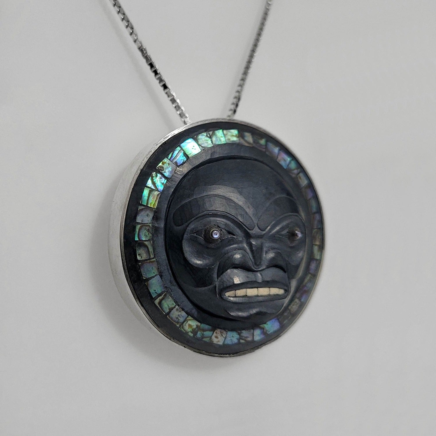 Argillite and Abalone Moon Pendant by Haida artist Andrew Williams