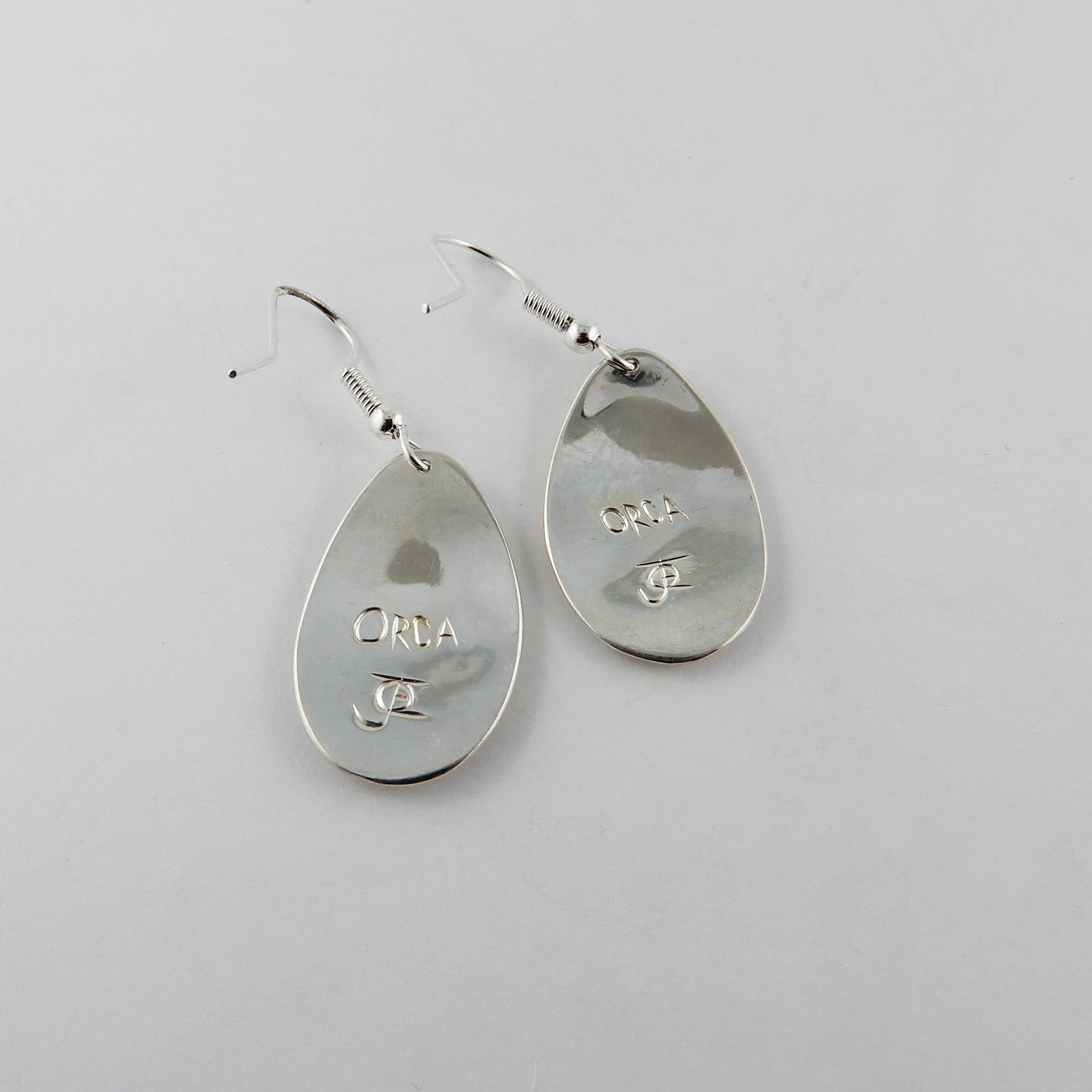 First Nations Silver and Gold Orca Earrings by Kwakwaka'wakw artist Joe Wilson