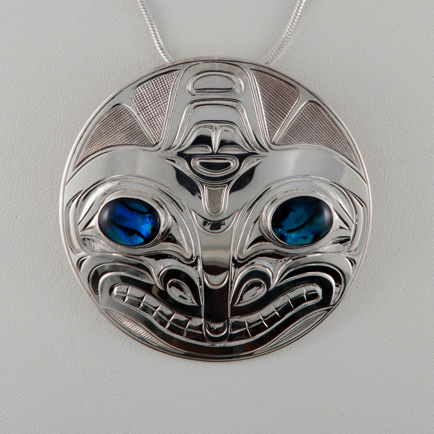 Round Silver Orca Pendant with Abalone by Kwakwaka'wakw artist Chris Cook