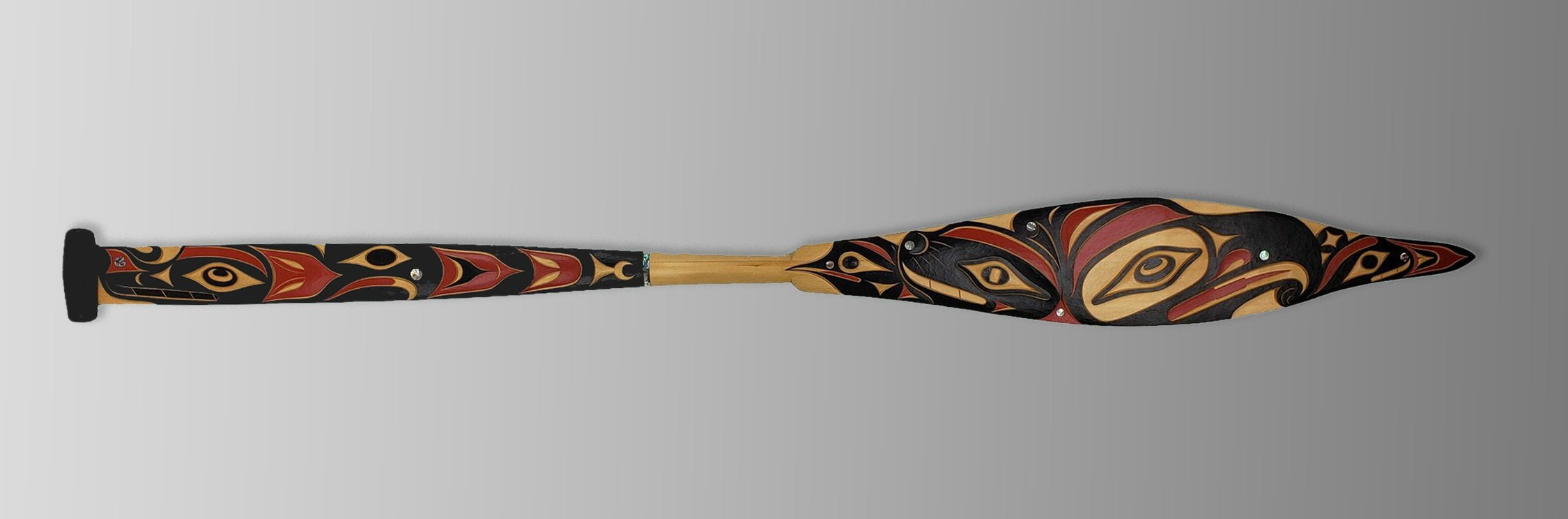 Double-sided Thunderbird and Lightning Snake Paddle by Nuu-chah-nulth carver Joshua Prescott