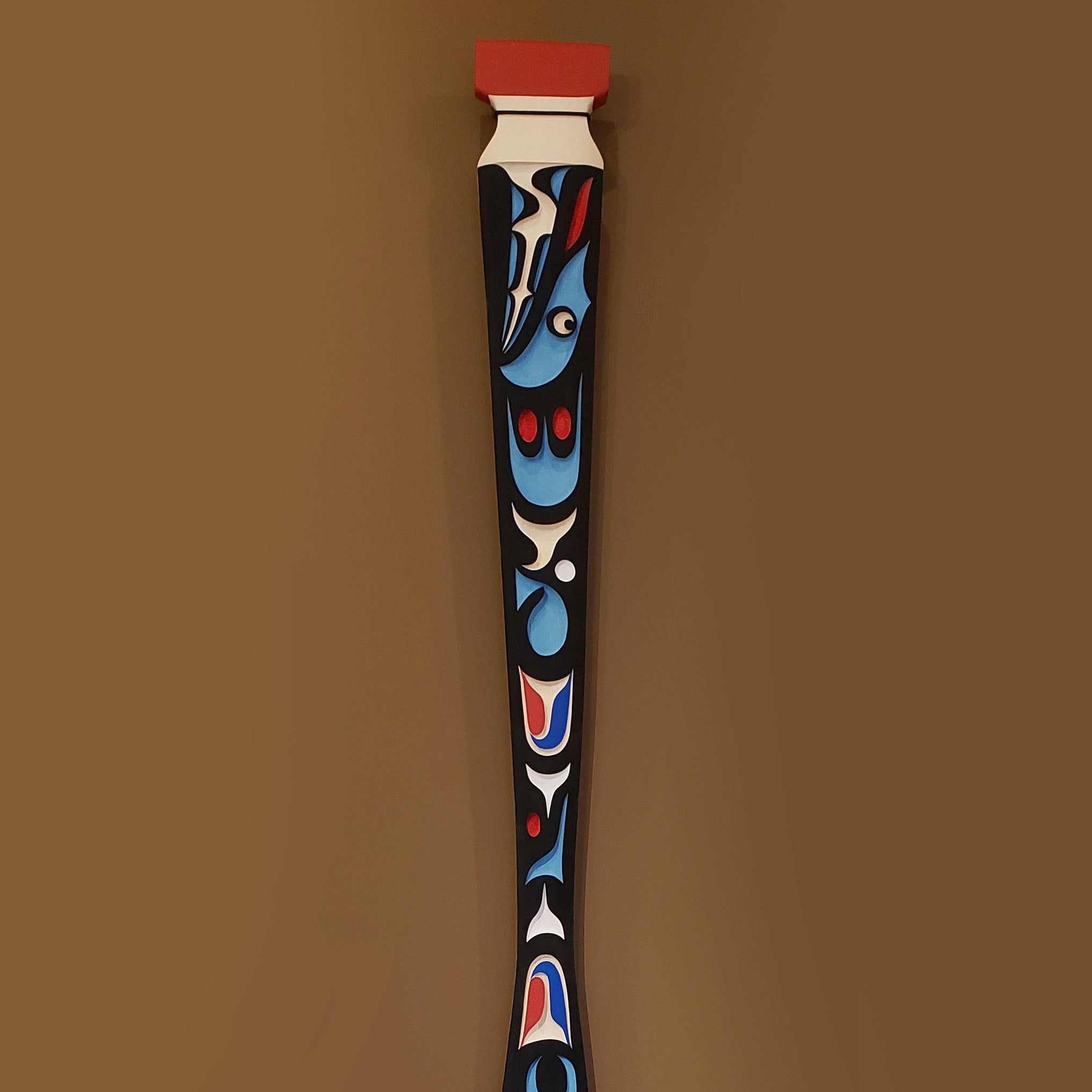 Sandblasted Cedar Sea Wolf Paddle by Kwakiutl artist Trevor Hunt