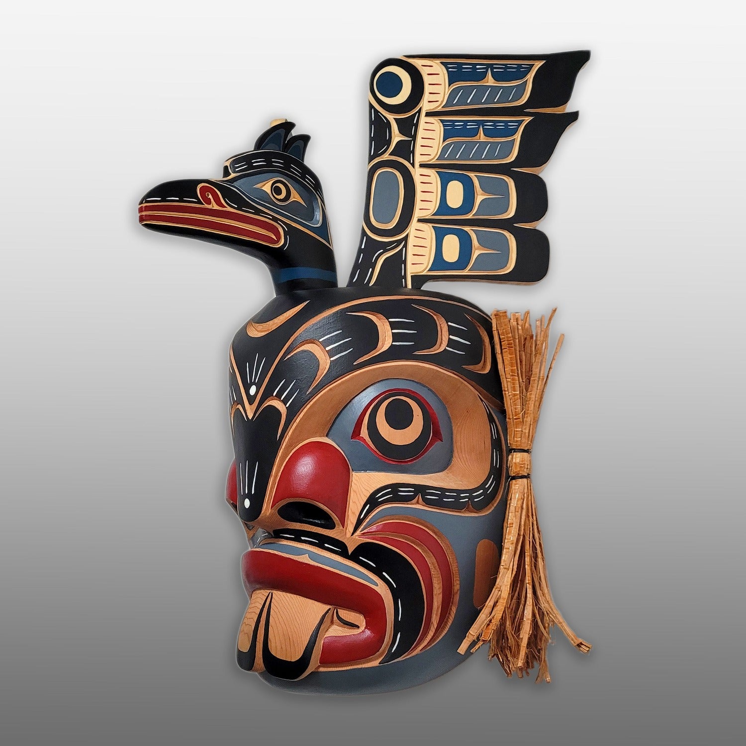 Pugwis and Raven Indigenous Mask hand-carved by Kwakwaka'wakw artist Bill Henderson
