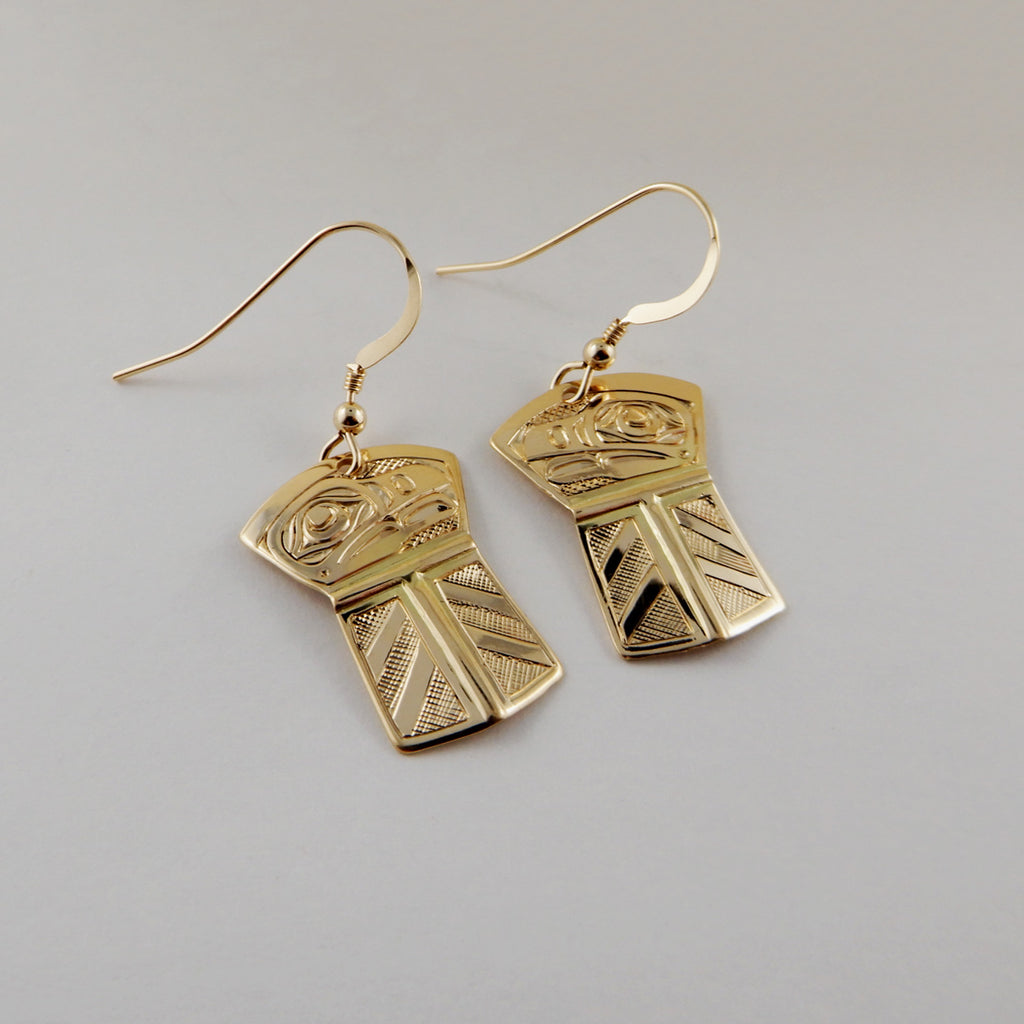 Gold Copper-shaped Raven stud earrings by Kwakwaka'wakw artist Joe Wilson