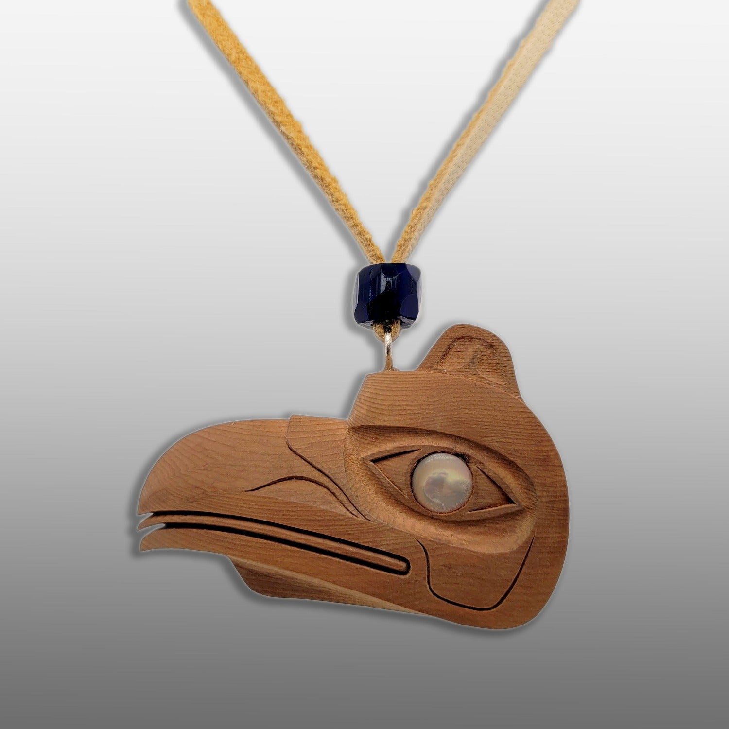 Yew Wood Raven Pendant by Haida Master Carver Ron Russ