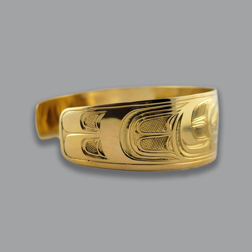 Gold Sea Eagle Bracelet by Kwakwaka'wakw artist Joe Wilson