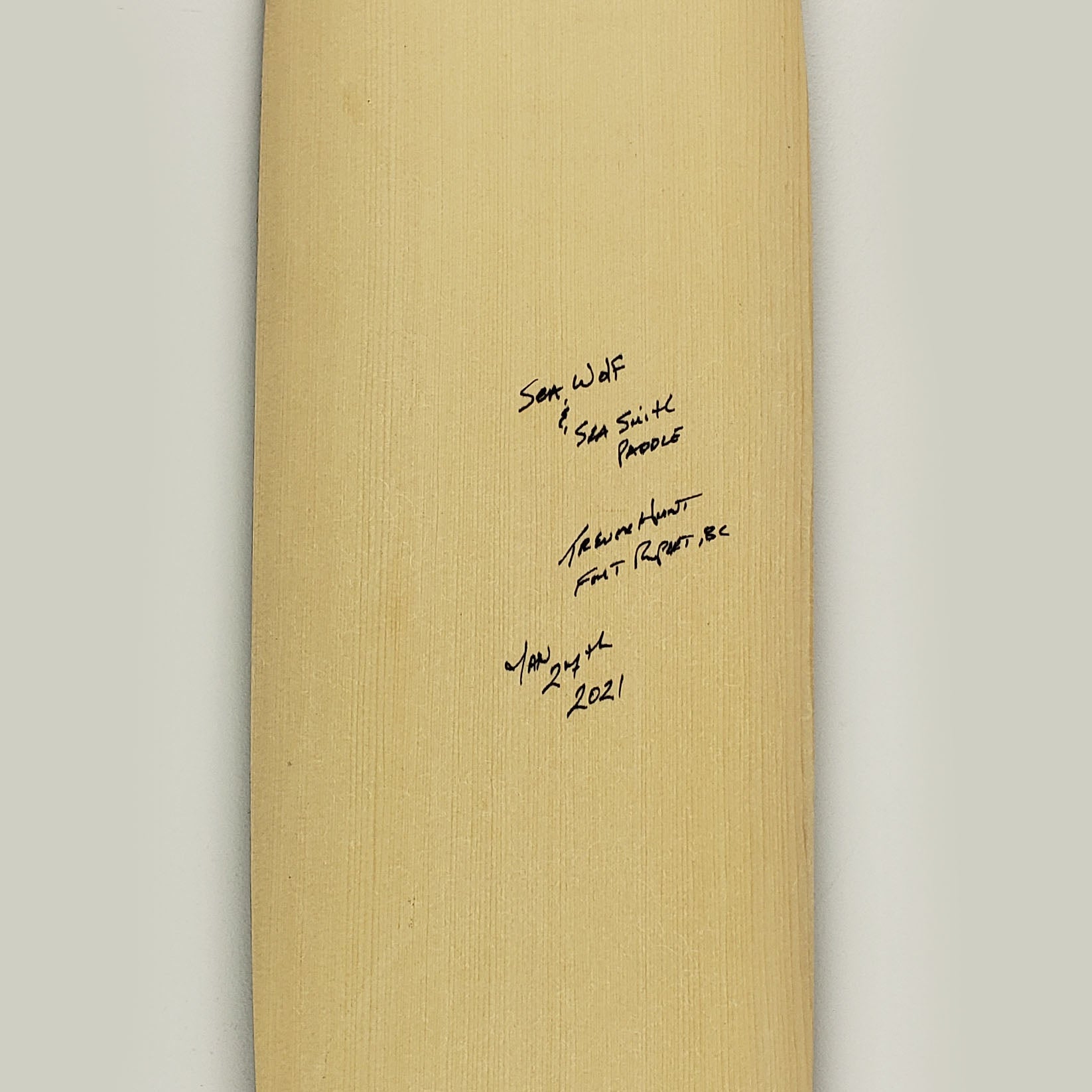 Sandblasted Cedar Sea Wolf Paddle by Kwakiutl artist Trevor Hunt