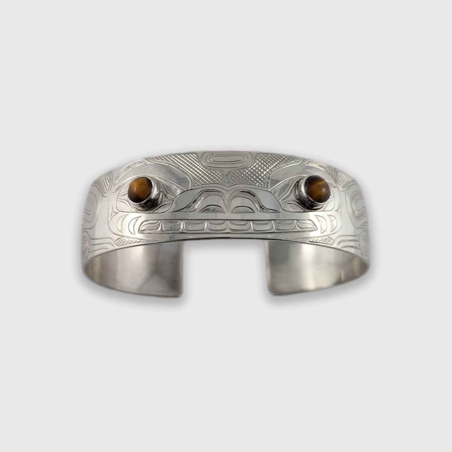 Silver and Tiger Eye Bear Bracelet by Kwakwaka'wakw artist Chris Cook