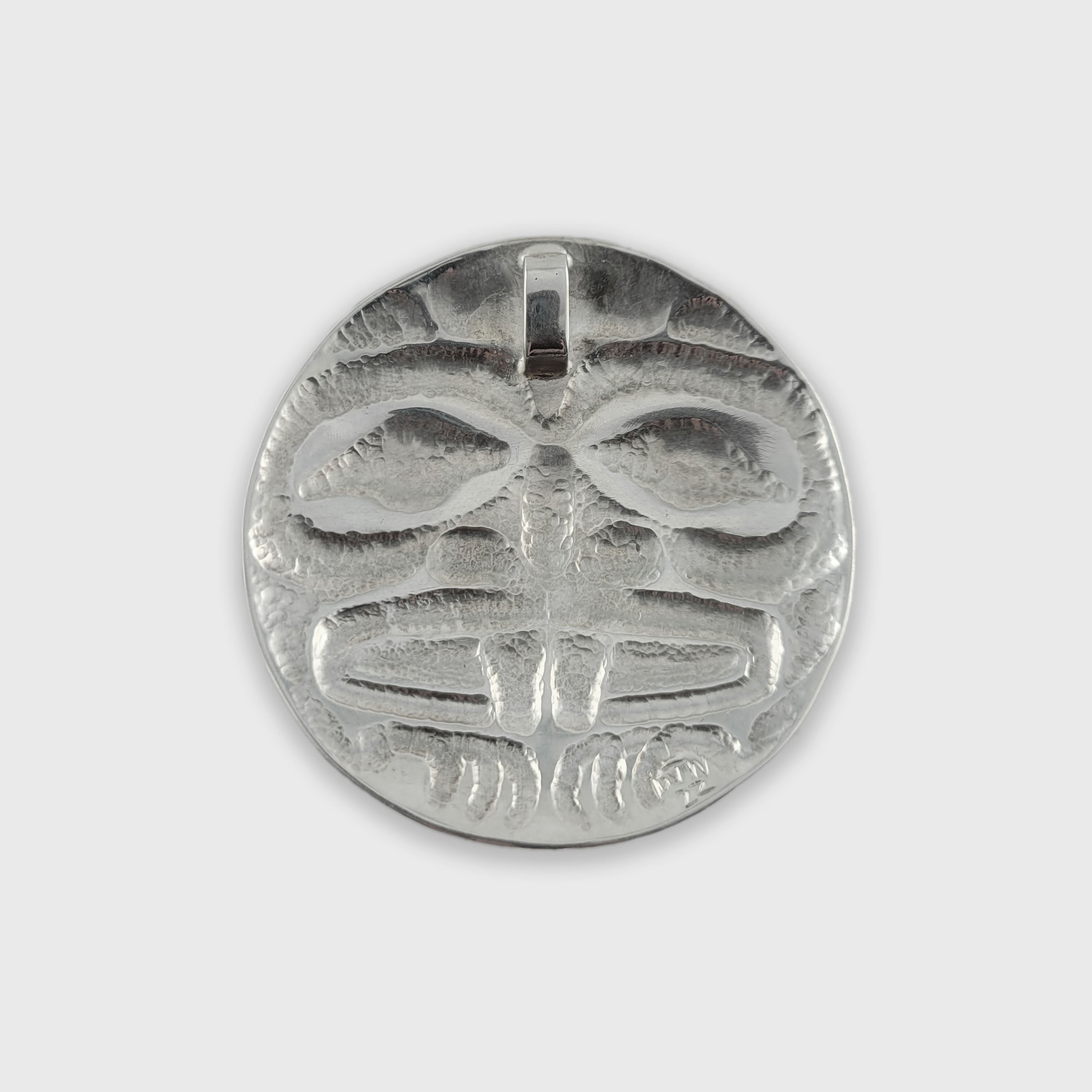 Silver Hammered and Carved Beaver Pendant by Haida artist Derek White