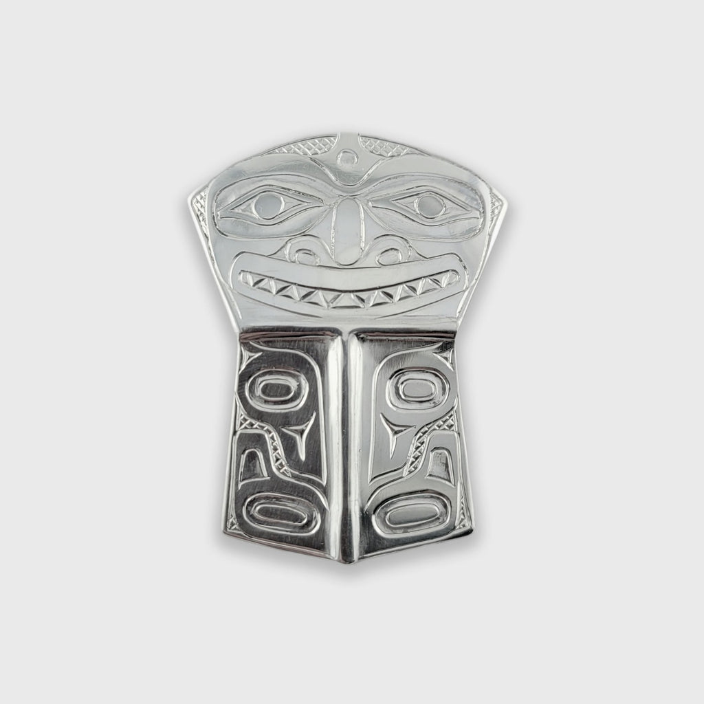 Silver copper-shaped Orca Pendant by Haida artist Derek White