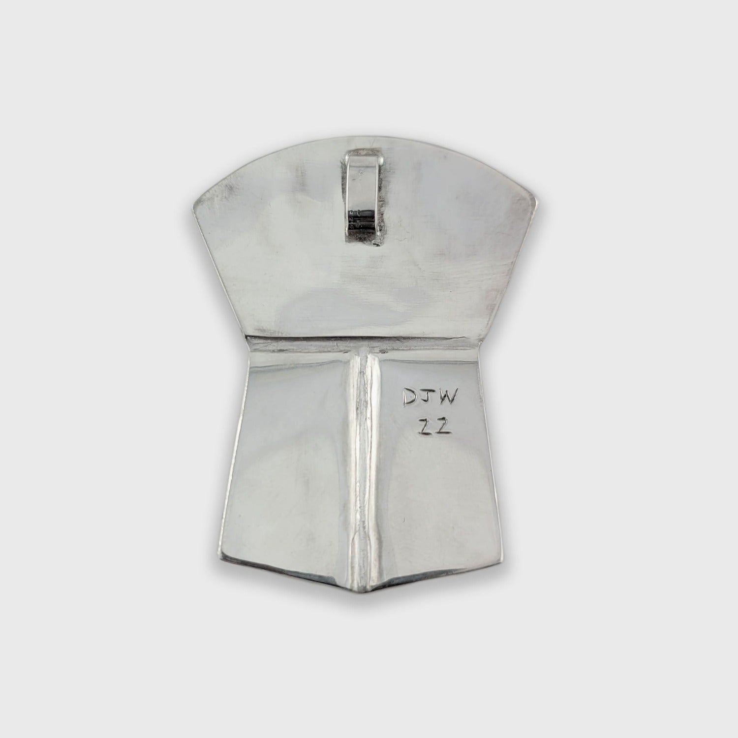 Silver copper-shaped Raven Pendant by Haida artist Derek White