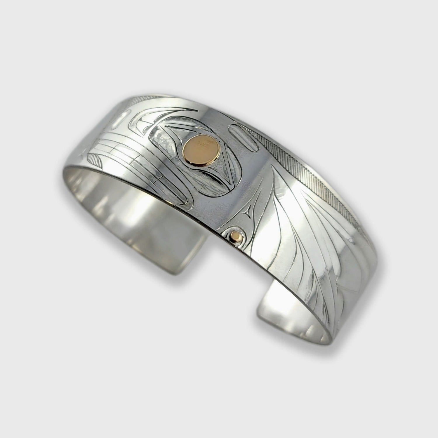 Silver and Gold Orca Bracelet by Haida artist Andrew Williams