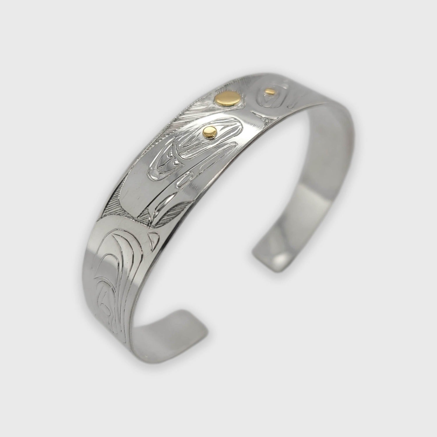 Silver and Gold Ravens Bracelet by Haida artist Andrew Williams