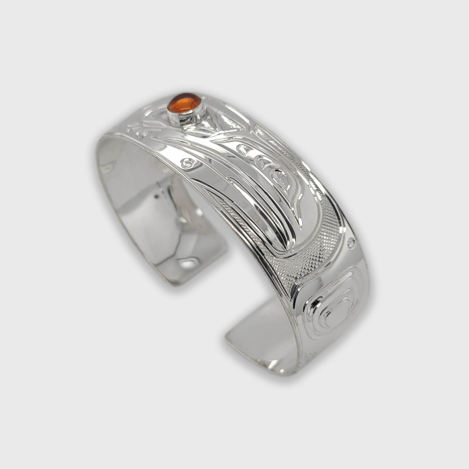 Silver and Amber Raven Bracelet by Kwakwaka'wakw artist Chris Cook