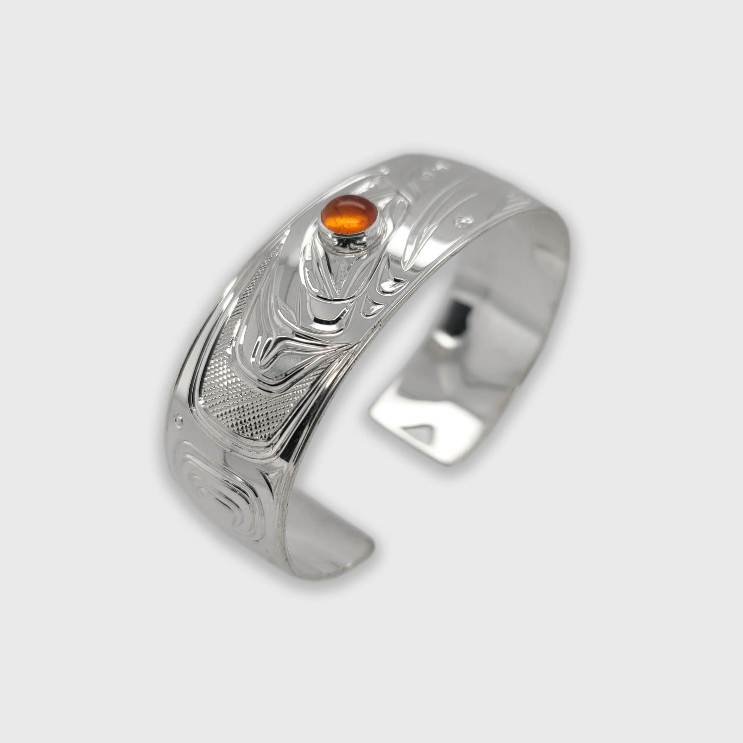 Silver and Amber Raven Bracelet by Kwakwaka'wakw artist Chris Cook