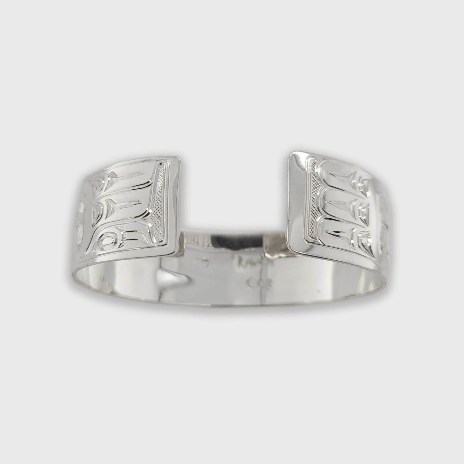 Silver and Amber Raven Bracelet by Kwakwaka'wakw artist Chris Cook