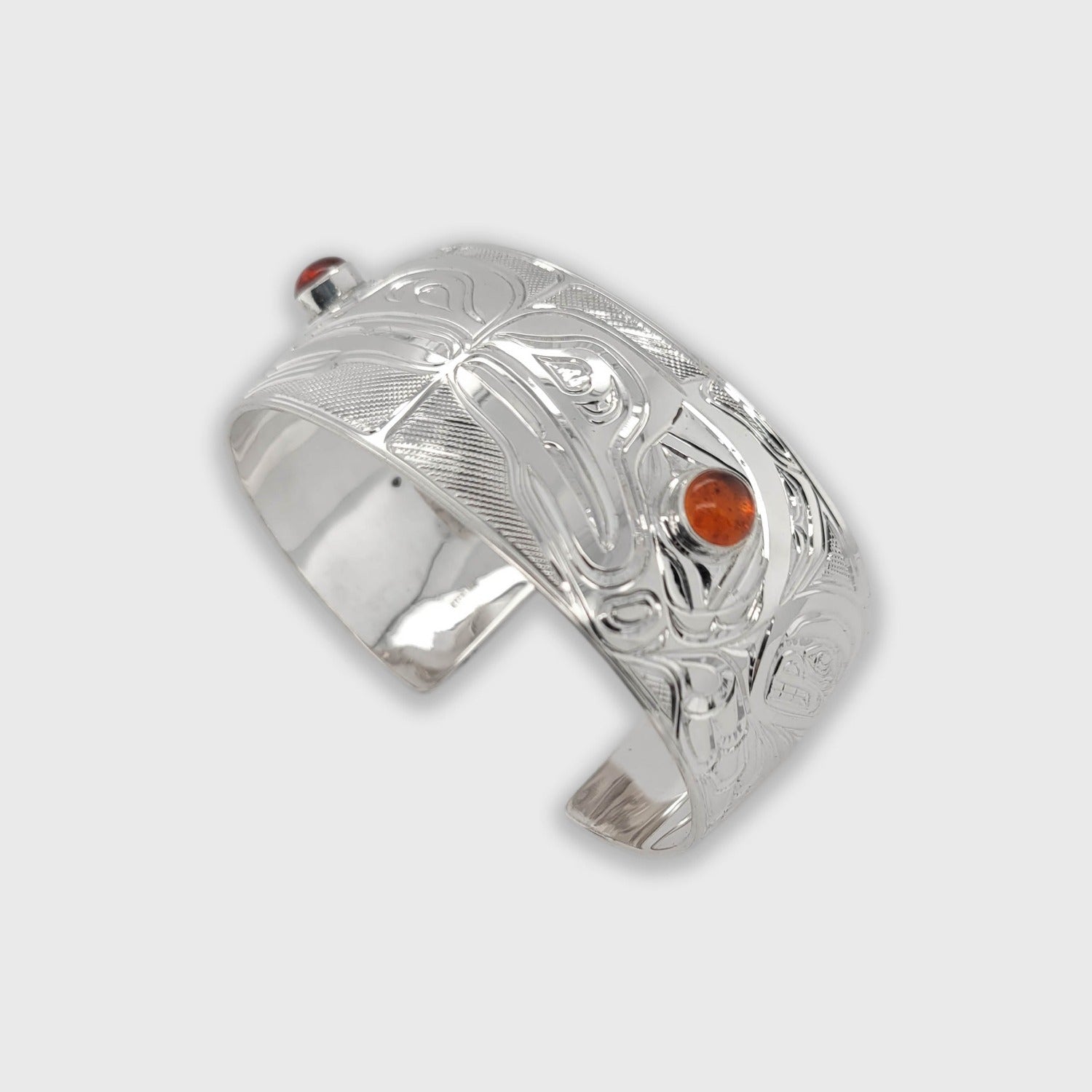 Silver with Amber Double ravens Bracelet by Kwakwaka'wakw artist Chris Cook