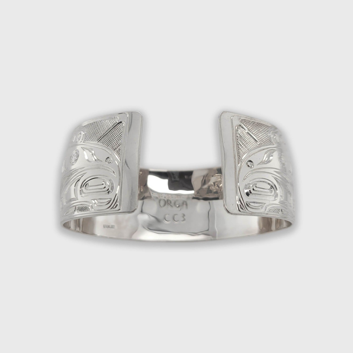 Silver and Topaz Orca Bracelet by Kwakwaka'wakw artist Chris Cook