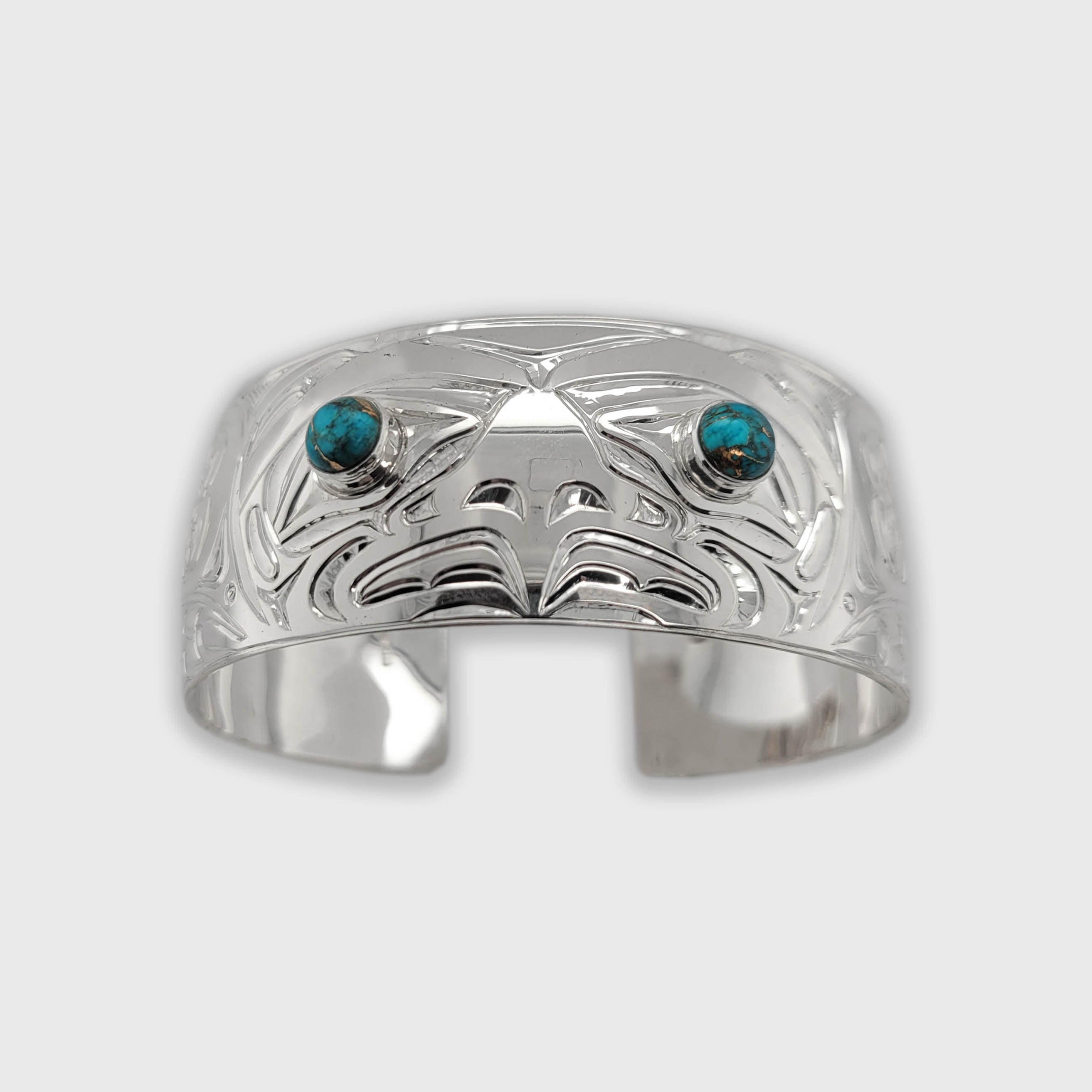 Silver and Turquoise Eagle Bracelet by Kwakwaka'wakw artist Chris Cook