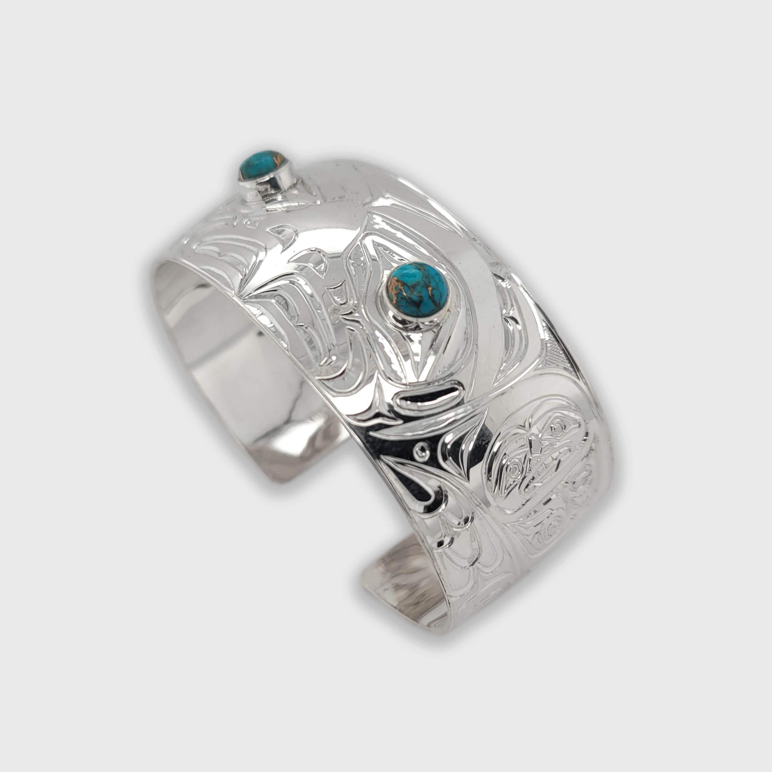 Silver and Turquoise Eagle Bracelet by Kwakwaka'wakw artist Chris Cook