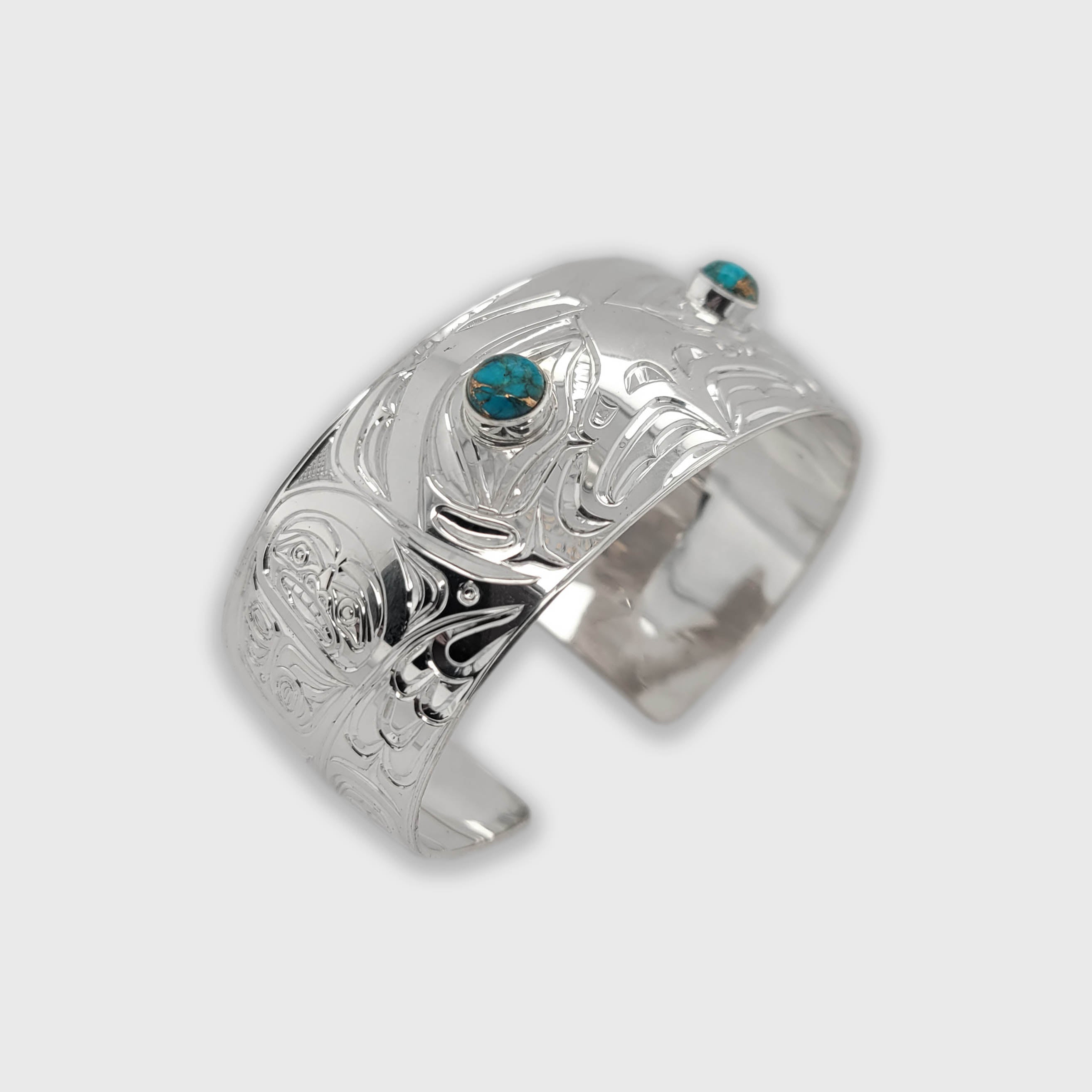 Silver and Turquoise Eagle Bracelet by Kwakwaka'wakw artist Chris Cook