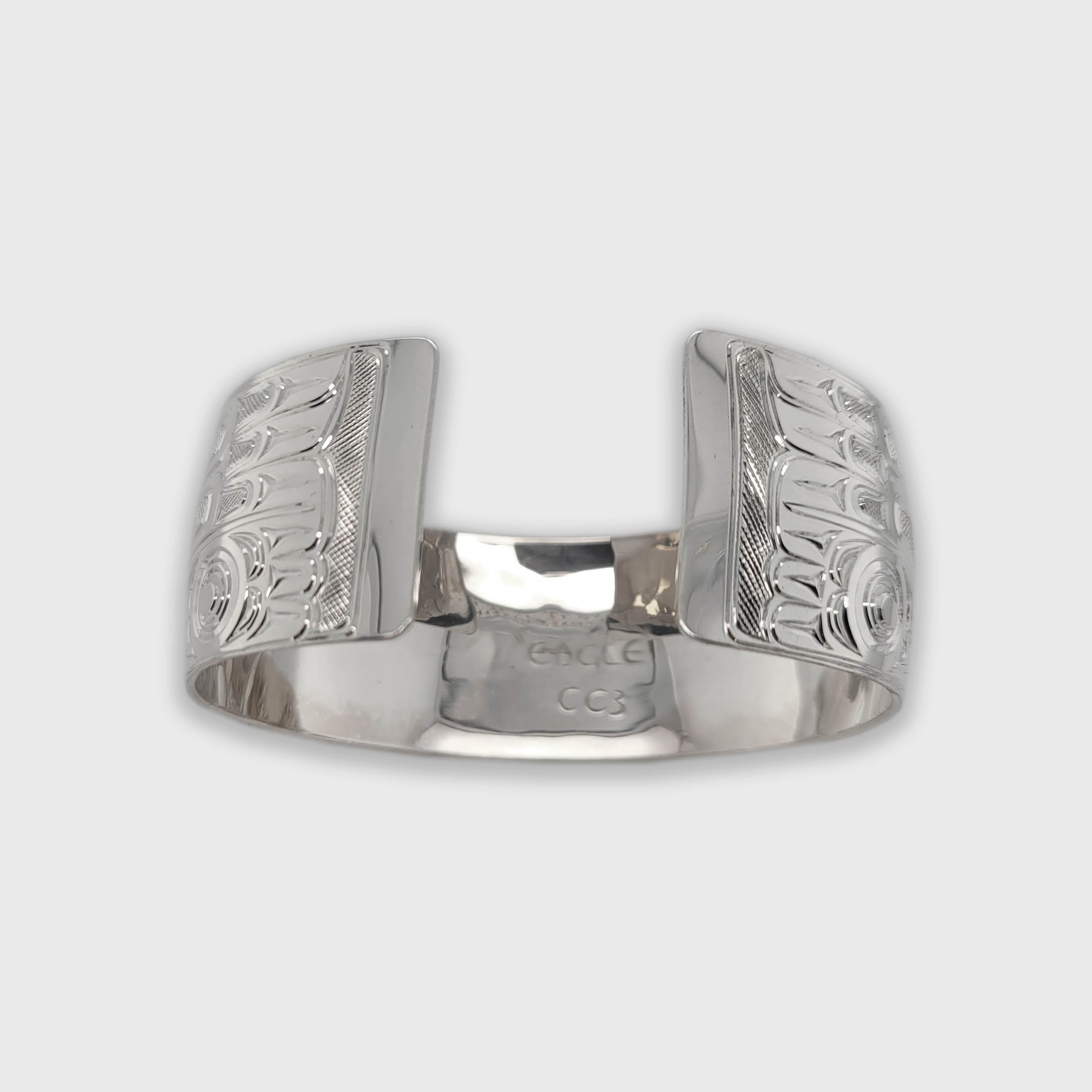 Silver and Turquoise Eagle Bracelet by Kwakwaka'wakw artist Chris Cook