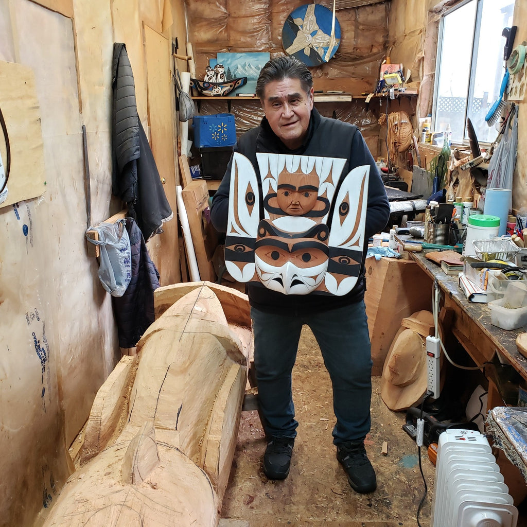 Nuu-chah-nulth carver Tim Paul holding Thunderbird Mask
