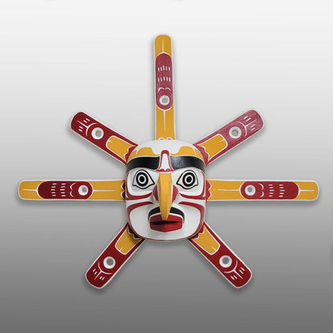 Indigenous cedar Sun Mask hand-carved by Namgis artist Shawn Karpes